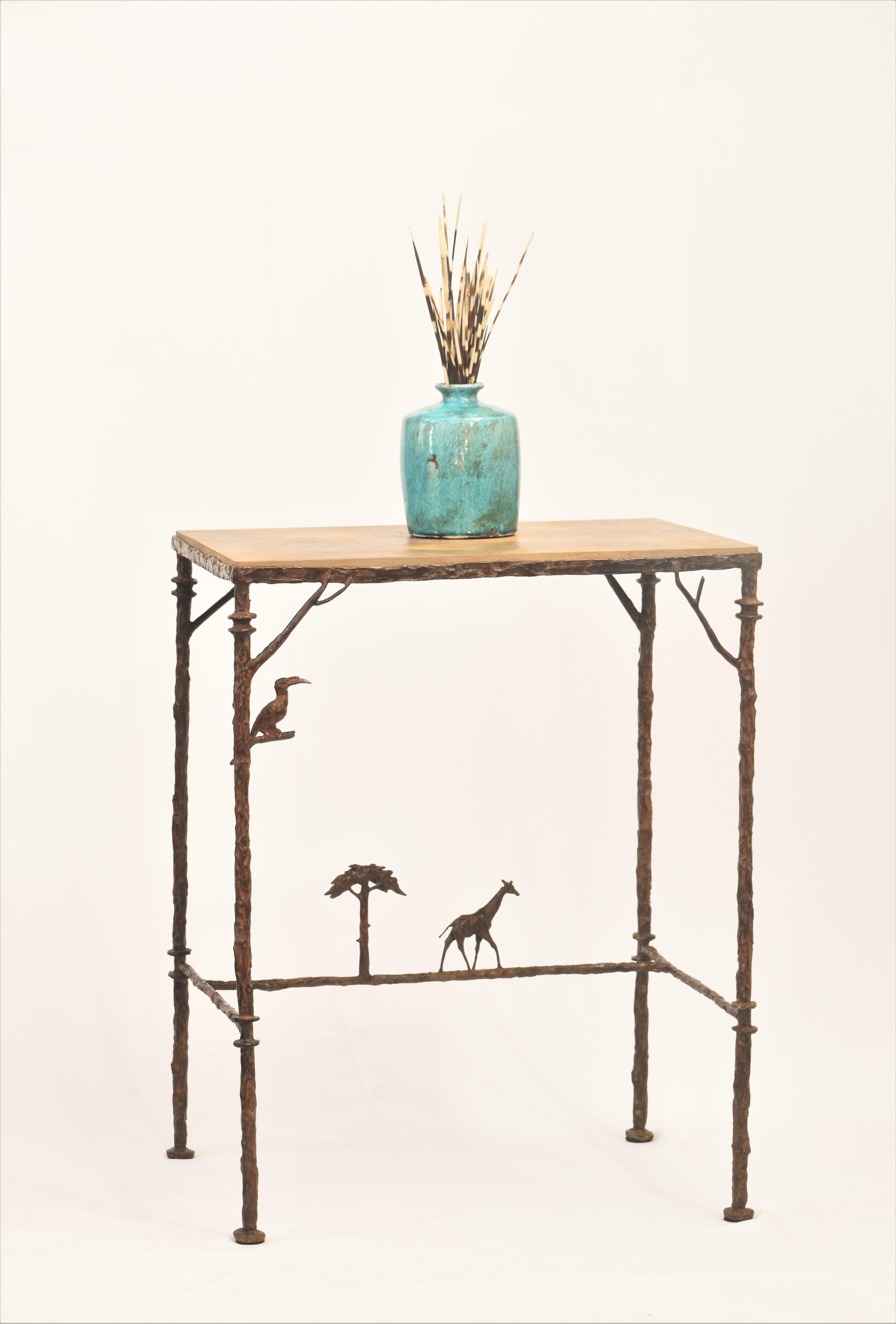 Cast Table in cast bronze with African theme For Sale