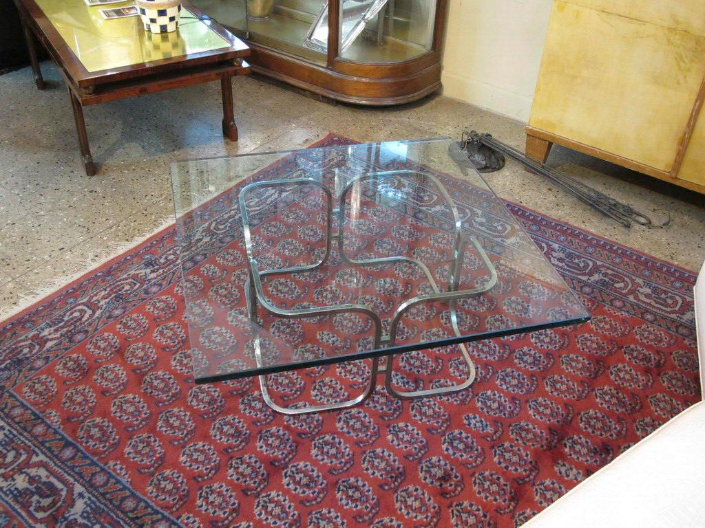 Table.

Material: chrome and glass.
Style: Art Deco
Country: italy
If you want to live in the golden years, this is the tables that your project needs.
We have specialized in the sale of Art Deco and Art Nouveau and Vintage styles since 1982. If you