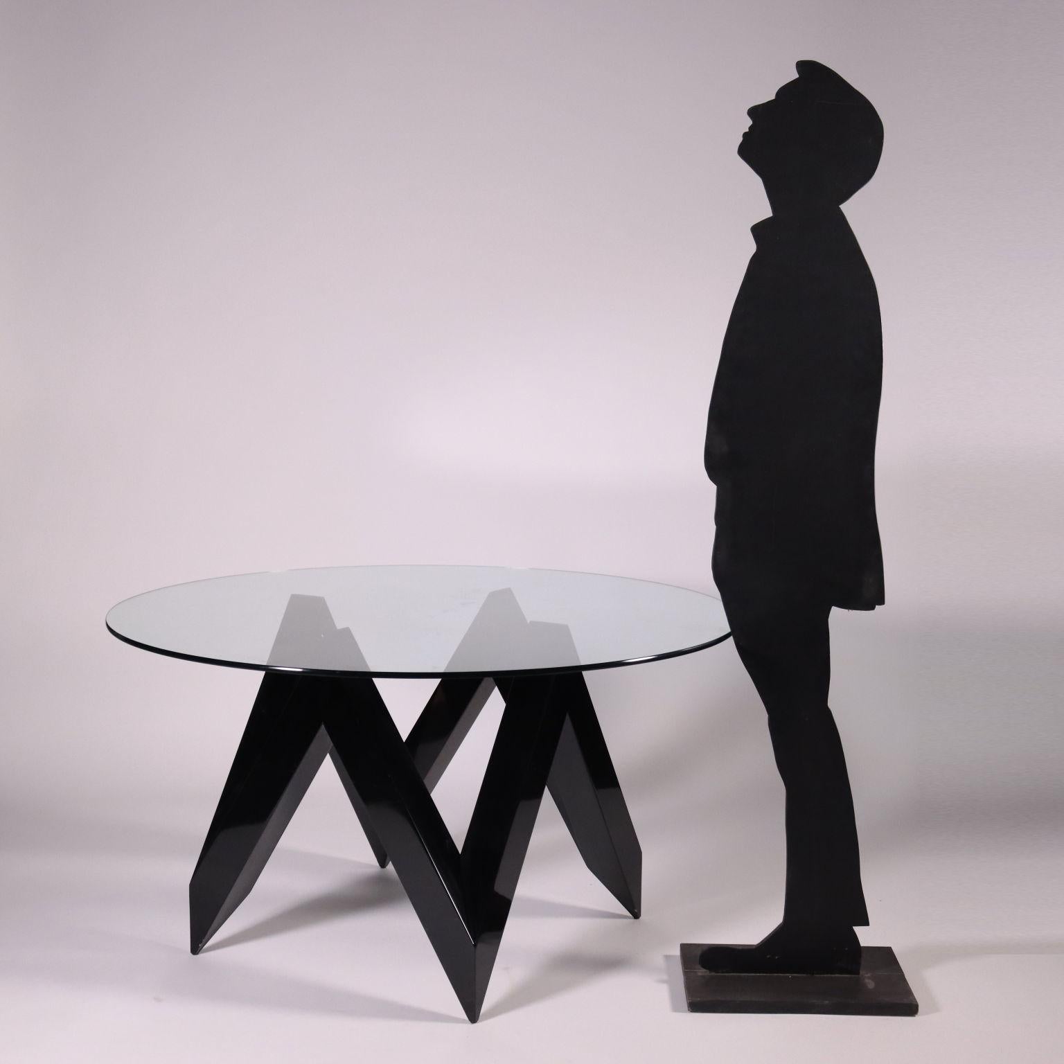 Table, lacquered wood base, glass top.