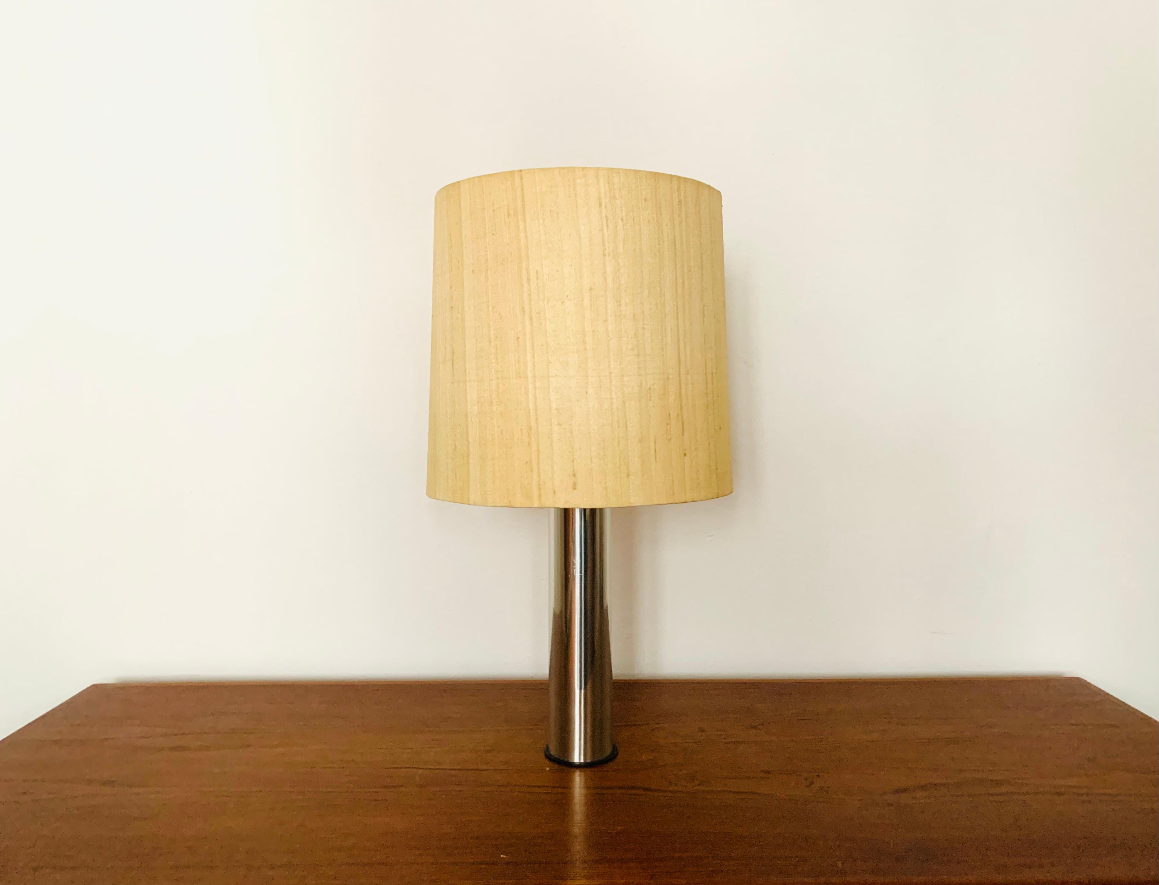 Large and beautiful table lamp from the 1960s.
Impressive design and very high-quality workmanship.
The lighting effect of the lamp is extremely beautiful.

Condition:

Very good vintage condition with slight signs of wear consistent with