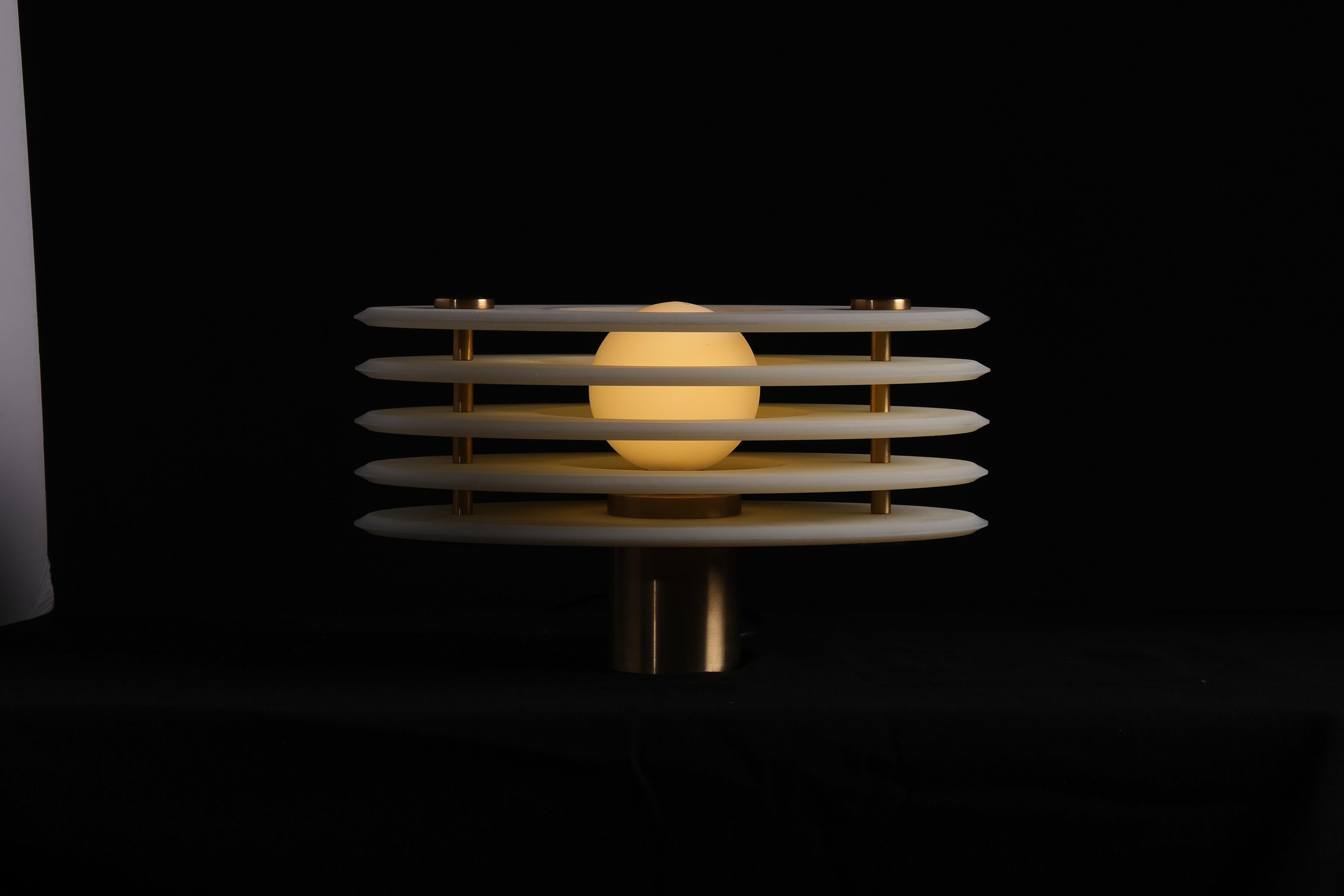 Table lamp 03 by Adam Caplowe for VIDIVIXI
Dimensions: L30 x W18 x H25 cm
Materials: Brass,Resin, Glass

All our lamps can be wired according to each country. If sold to the USA it will be wired for the USA for instance.

Adam Caplowe,