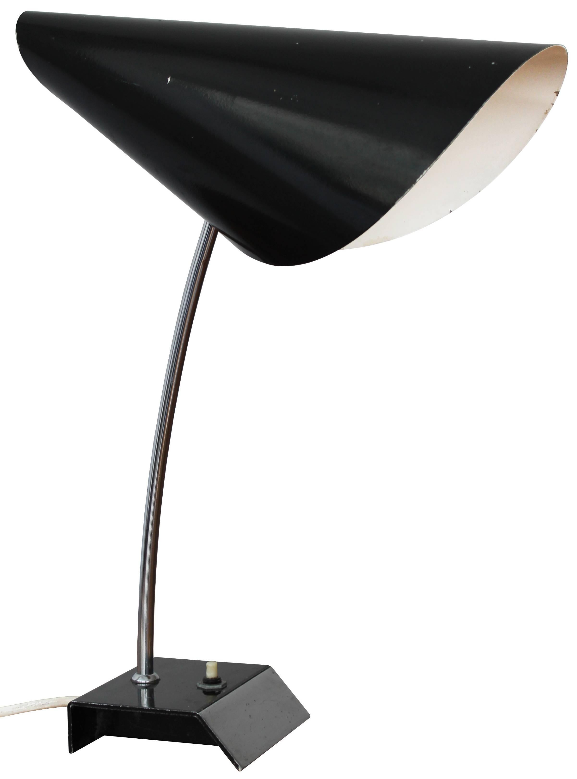 This is one of the true icons of the 20th century Czech design, the table lamp 0513 by famous lighting designer Josef Hurka. This lamp is often nicknamed the 