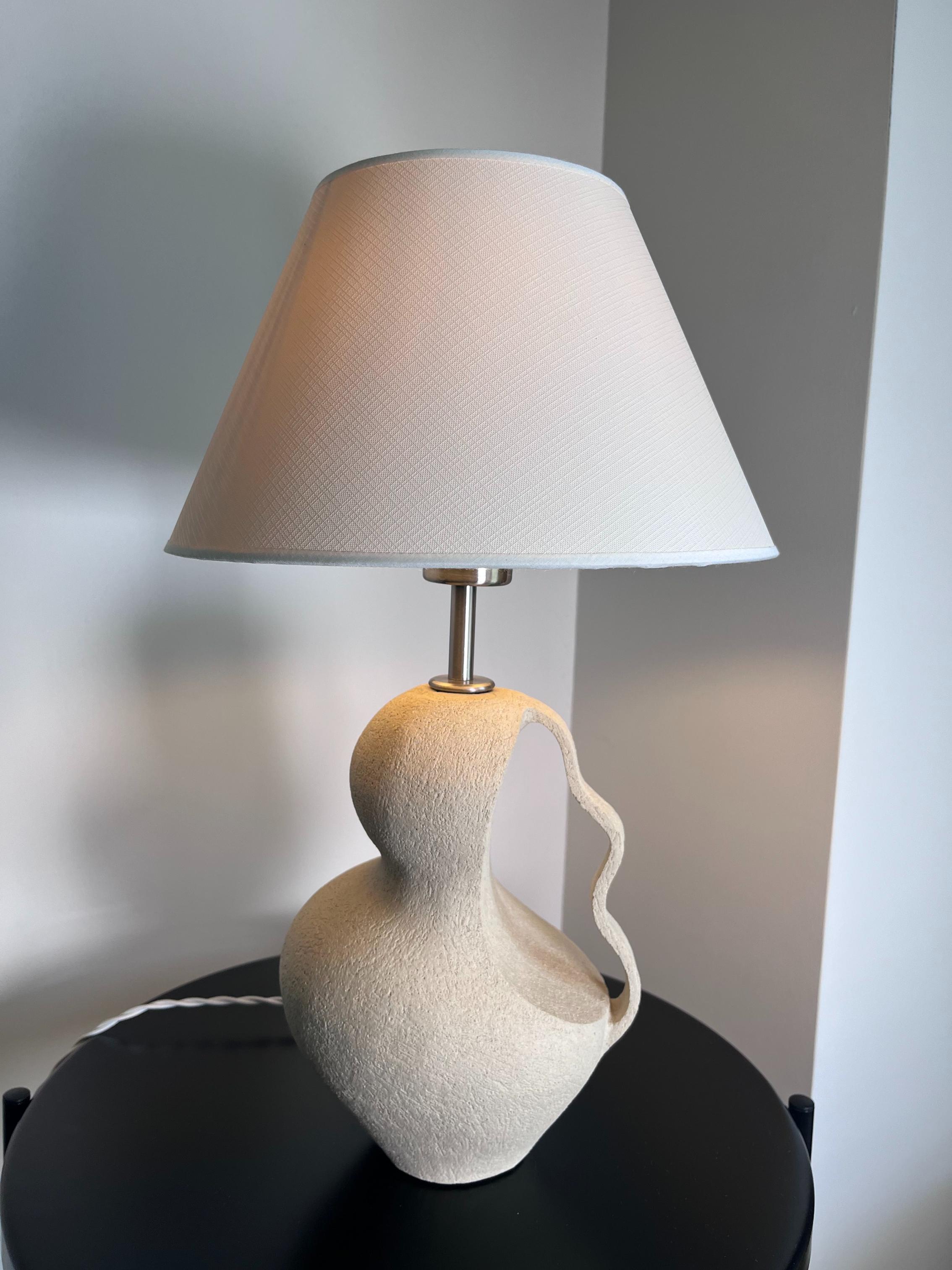 Table Lamp 2 Vase by Rezzo Ceramics
Dimensions: W 18 x D 17 x H 53 cm (Dimensions may vary)
Materials: Stoneware
Finish: Unglazed

Esra Misirli Kubilay is a Turkish ceramic artist. She took the design in to the focus of her life and worked as a