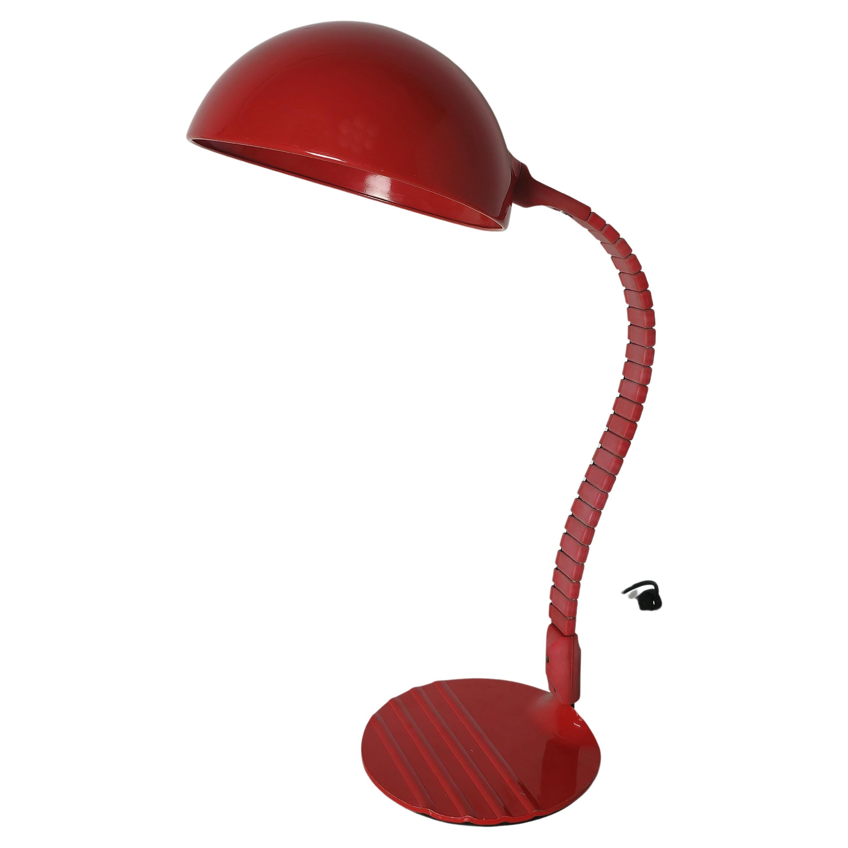 Table lamp made with aluminum diffuser, flexible plasticized arm and circular base in red enamelled metal. Elio Martinelli, Martinelli Luce mod.660, Italy 70s.


Note: We try to offer our customers an excellent service even in shipments all over the