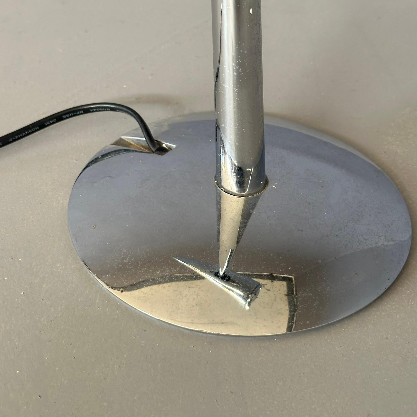 Italian Table Lamp 'ARA', design by Phiiippe Starck for Flos, 1988, chromed steel, works For Sale