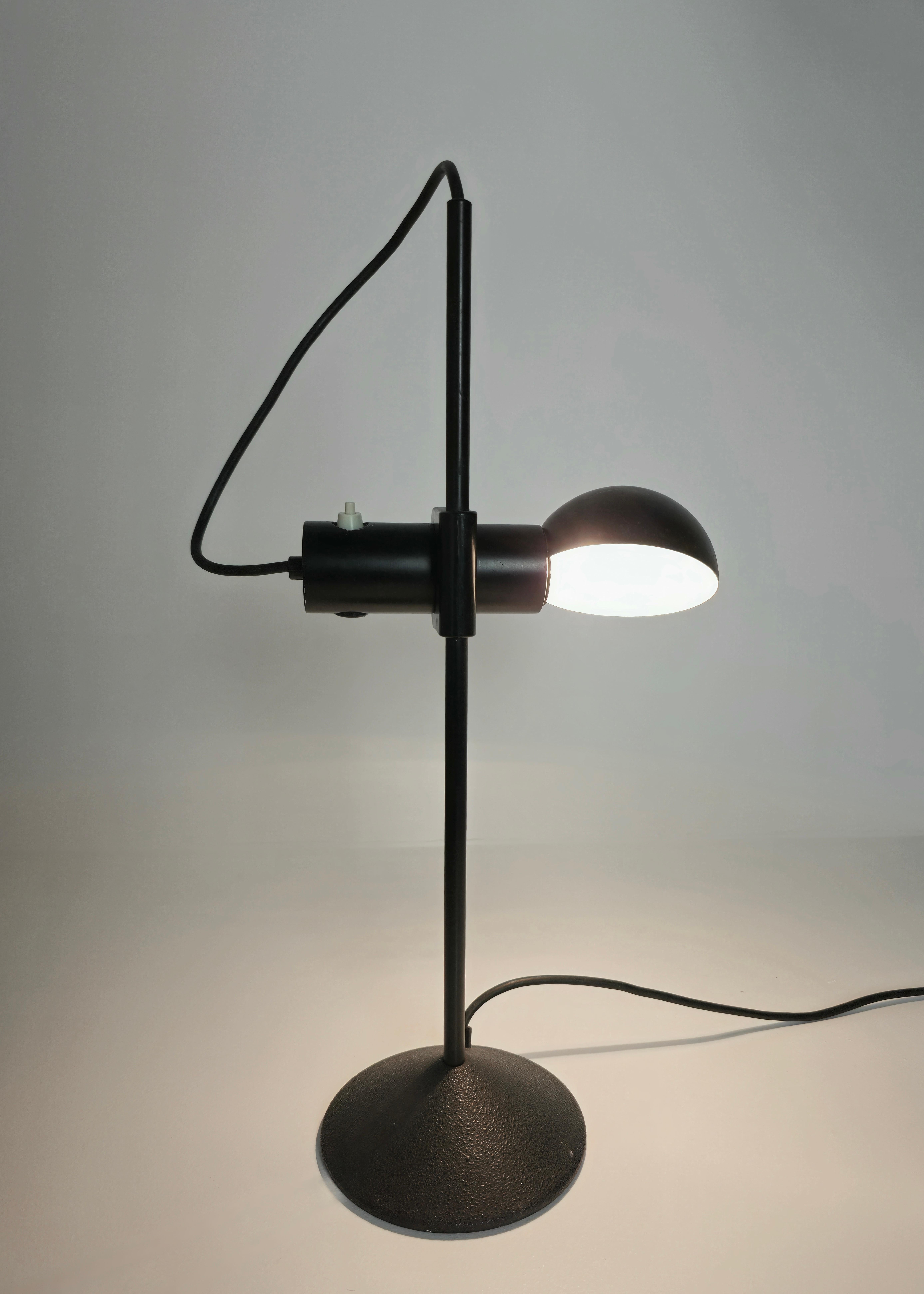 Rare table lamp produced in Italy in the 1960/70s. Barbieri & Marianelli for Tronconi. Structure in black painted metal. Adjustable height, adjustable hemispherical diffuser, circular cone base. Keeps every original part. Perfectly working.