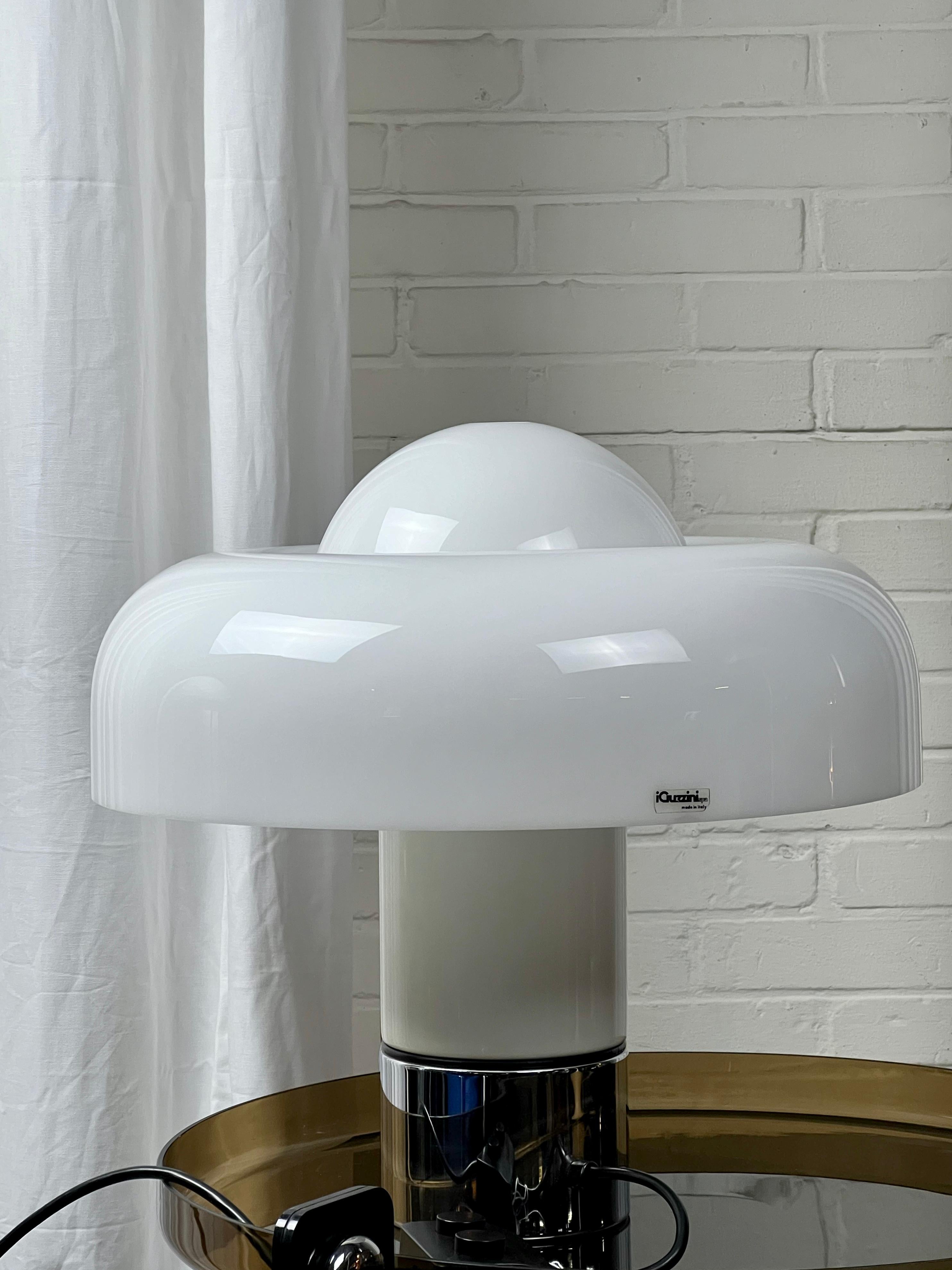 Fantastic piece of design history: the Brumbry table lamp by Luigi Massoni for Harvey Guzzini, Italy 1970's. A masterpiece of fluidity in design, a true statement of Italian craftmenship from the heydays of modernity.
 
A must have for every design