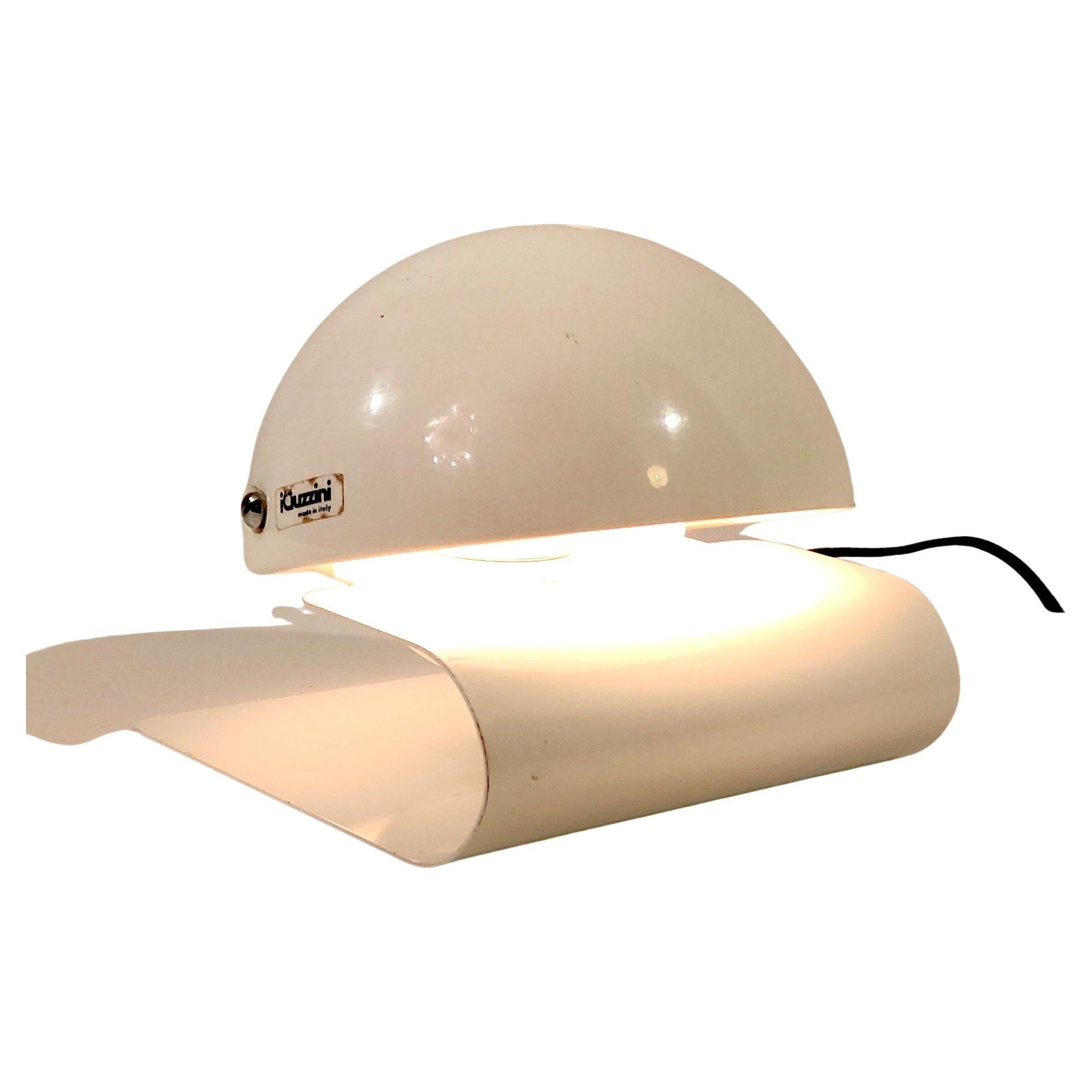 Dive into the enchanting world of 1970s Italian design with the Harveiluce iGuzzini Bugia Lamp, exquisite creation by the renowned Giuseppe Cormio for the Milano 1975 Fair. These iconic pair in pearl white is a testament to Guzzini’s innovative