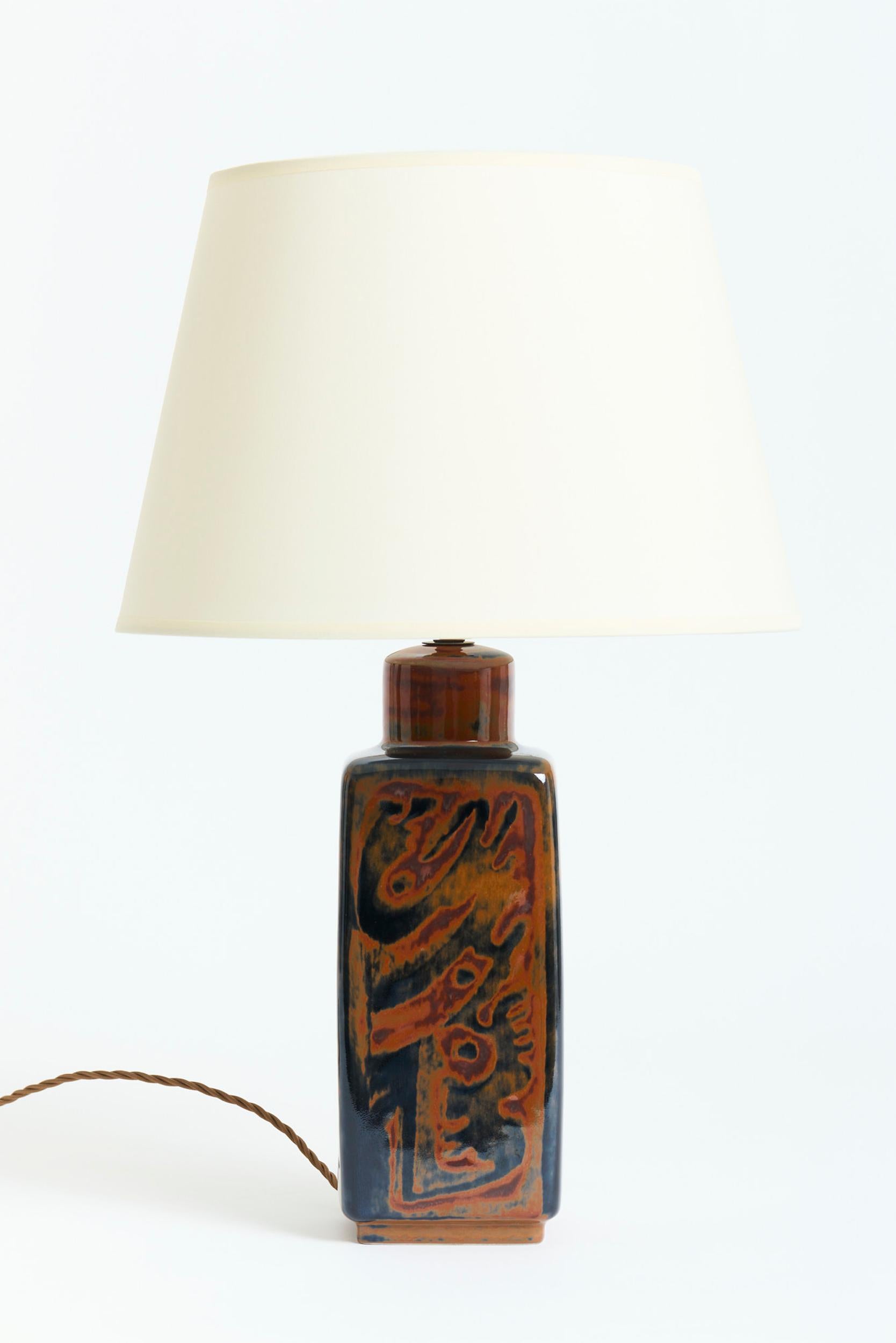 A glazed ceramic table lamp by Carl-Harry Stålhane (1920-1990) for Rörstrand.
Sweden, 1960s
With the shade: 56 cm high by 36 cm diameter
Lamp base only: 38.5 cm high by 12 cm wide by 11 cm depth