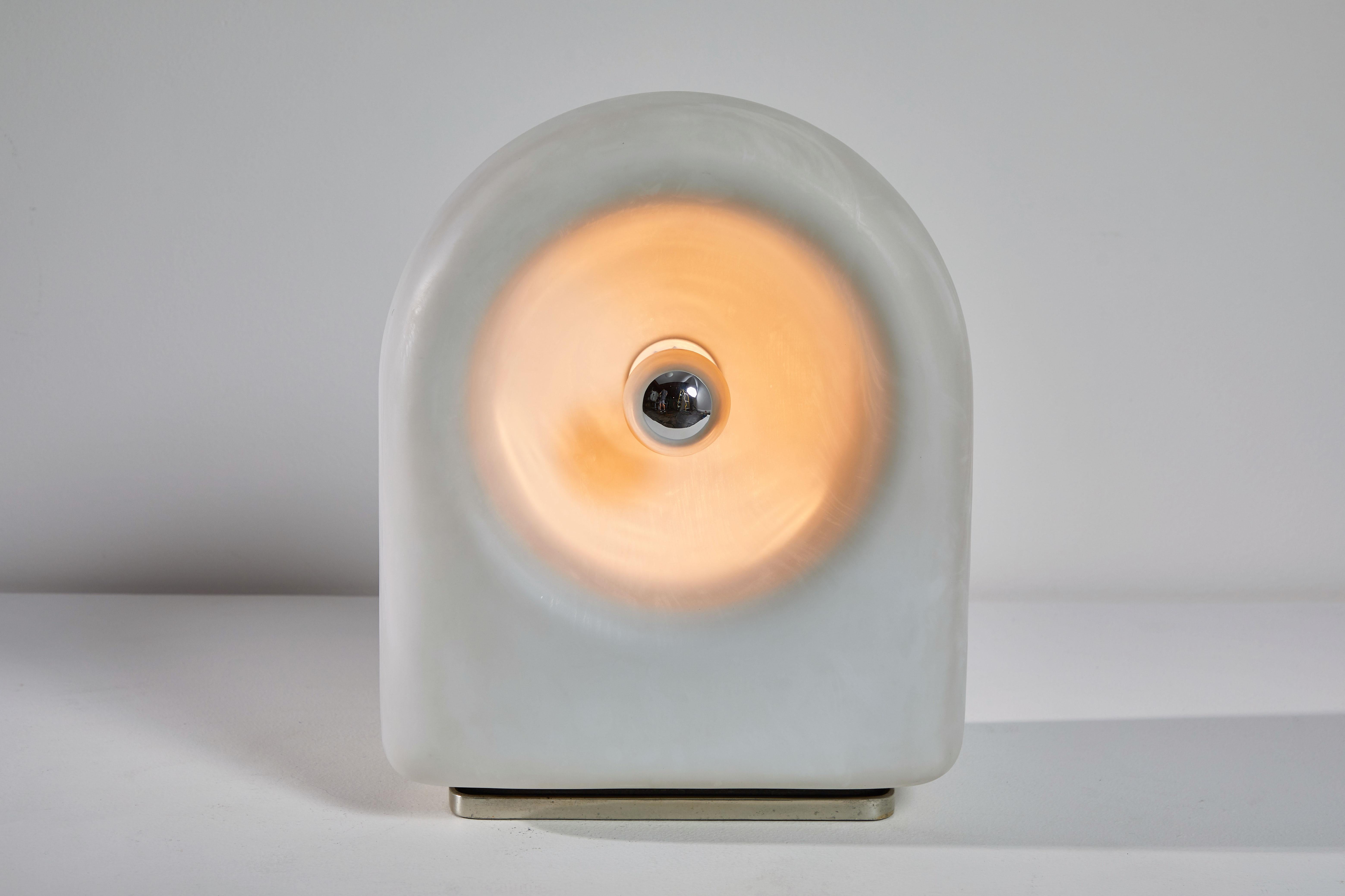 Table lamp by Claudio Salocchi for Lumenform. Designed and manufactured in Italy, 1968. Metal, blown polished milk glass. Original cord. 
Takes one E27 60w maximum bulb.
 