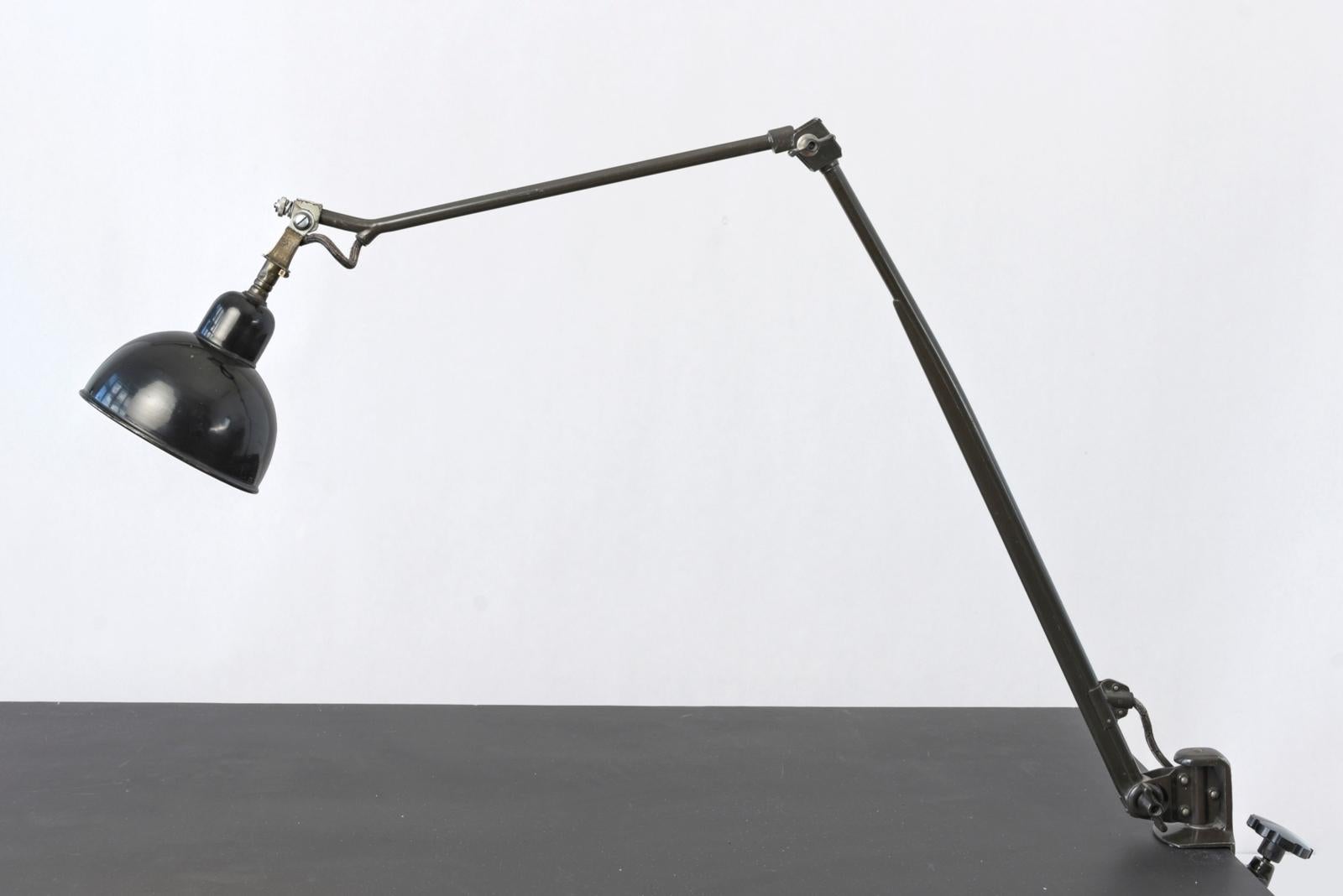 H 120 cm W 100 cm D 16.5 cm

Material: painted sheet steel, nickel-plated brass, painted cast iron, painted sheet iron shade, black textile-coated connection cable, one E 27 light point, switch integrated in the socket.

Condition: good

Special