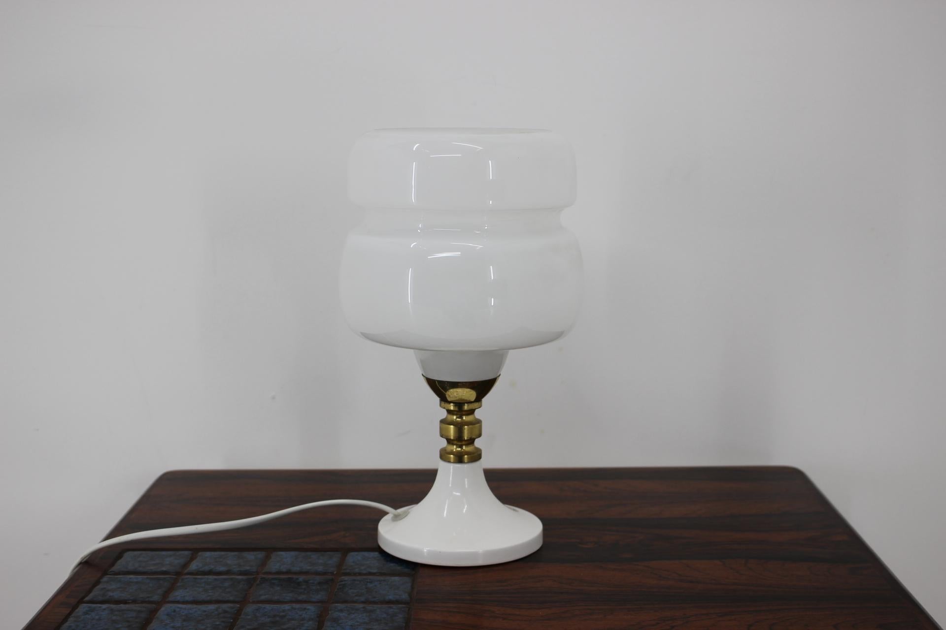 - Made in Czechoslovakia
- Made of metal, milk glass, brass
- Re-polished
- Fully functional
- Good, original condition.