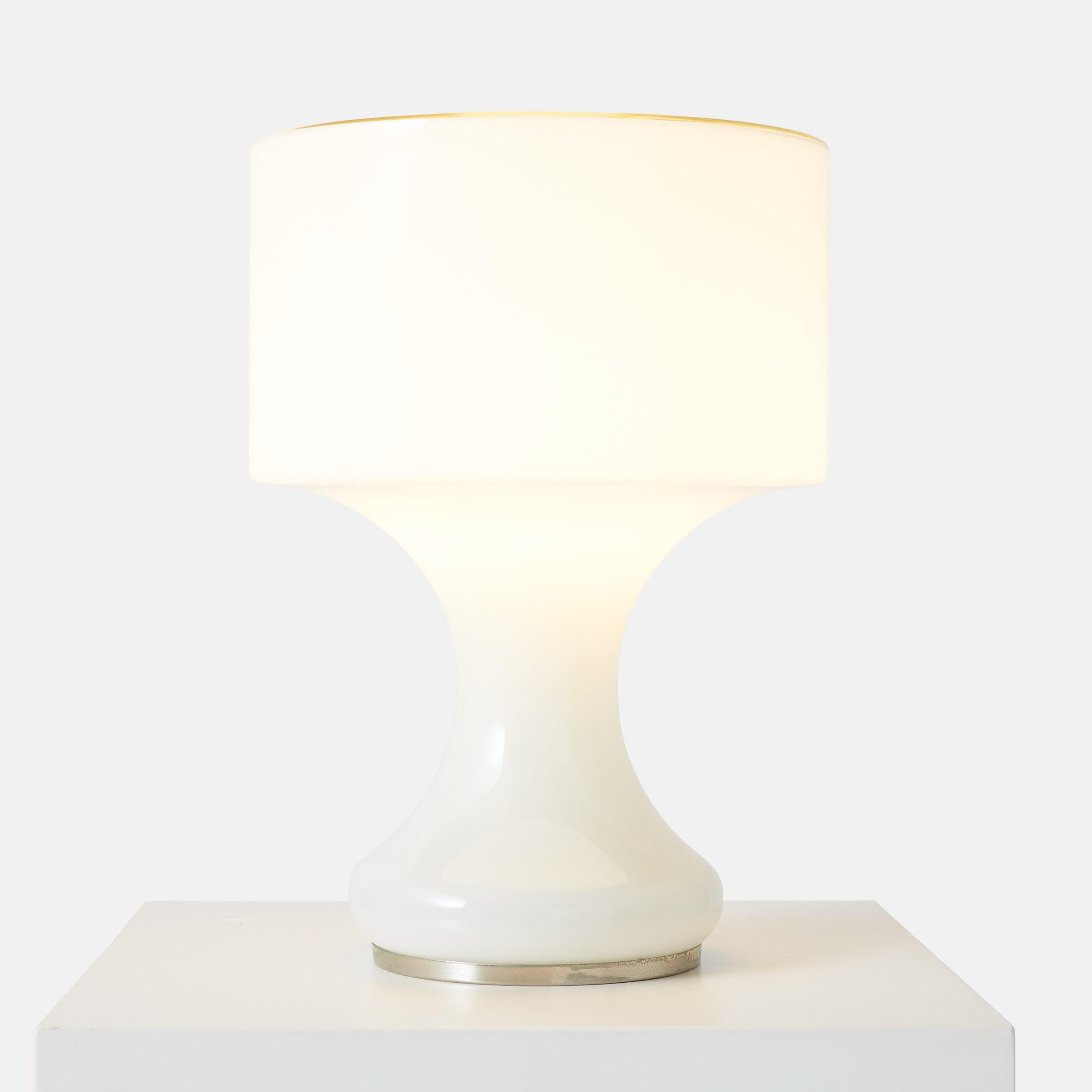An opaque white hand blown glass Sebenica table lamp by Enrico Capuzzo for Vistosi.
No chips or cracks in the glass.
Original wiring.