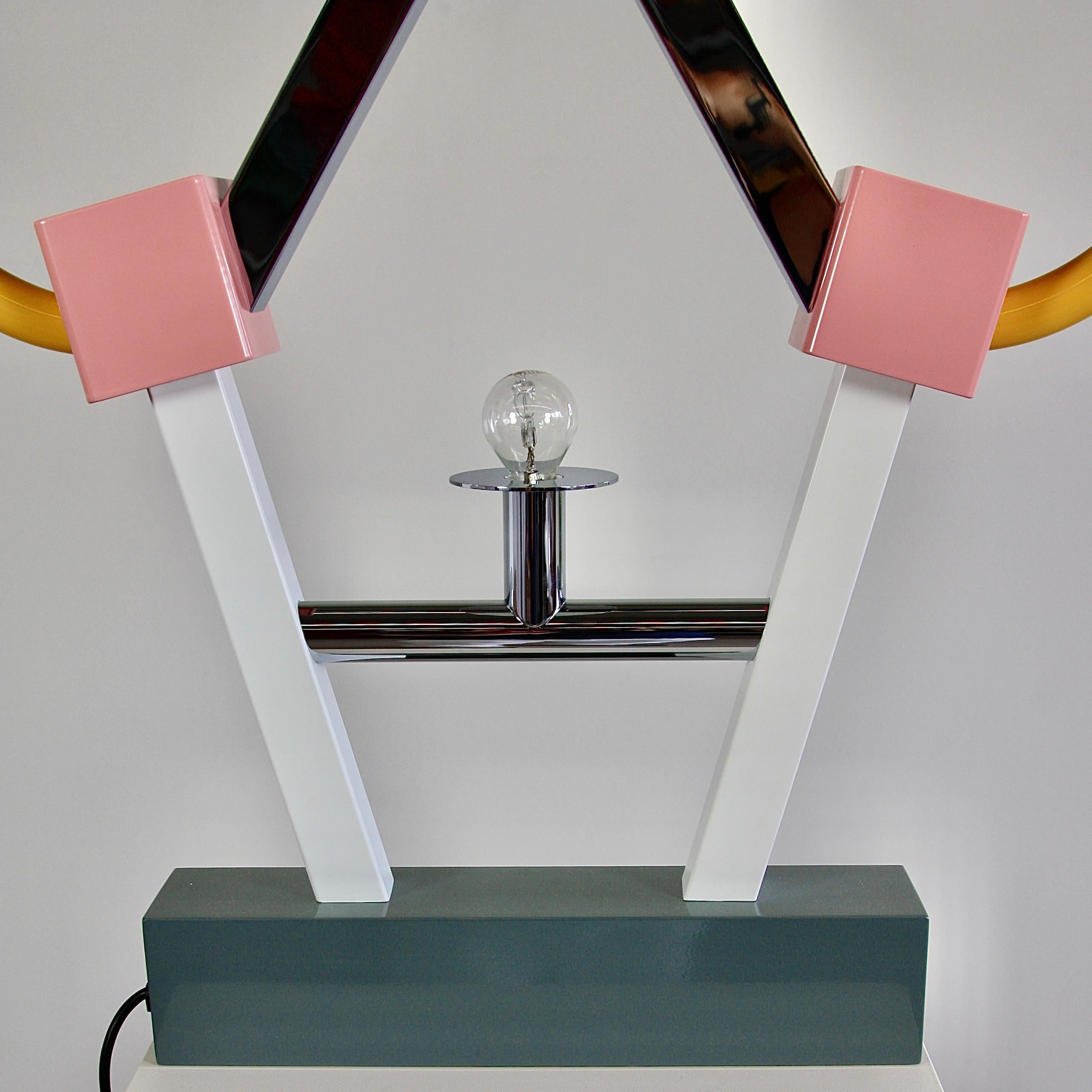 Ashoka table lamp, designed by Ettore Sottsass. Italy, 1981.

Metal construction, lacquered in different colours. Numbered edition.

The ‘Ashoka’ table lamp is one of the of several lamp designs produced by Ettore Sottsass for Memphis. In form,