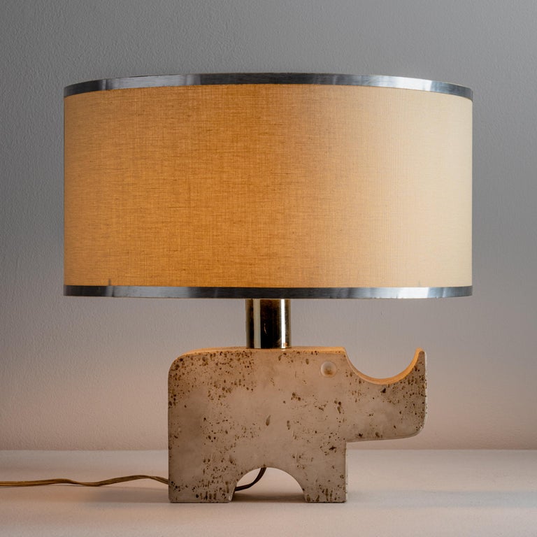 Table lamp by Fratelli Minelli. Designed and manufactured in Italy, circa 1970's. Refurbished linen shade with original metal trimmed frame Travertine, Original EU cord. Lamping: Allow 1qty 120v E27 Socket with 75w Frosted Bulb. Light bulbs not
