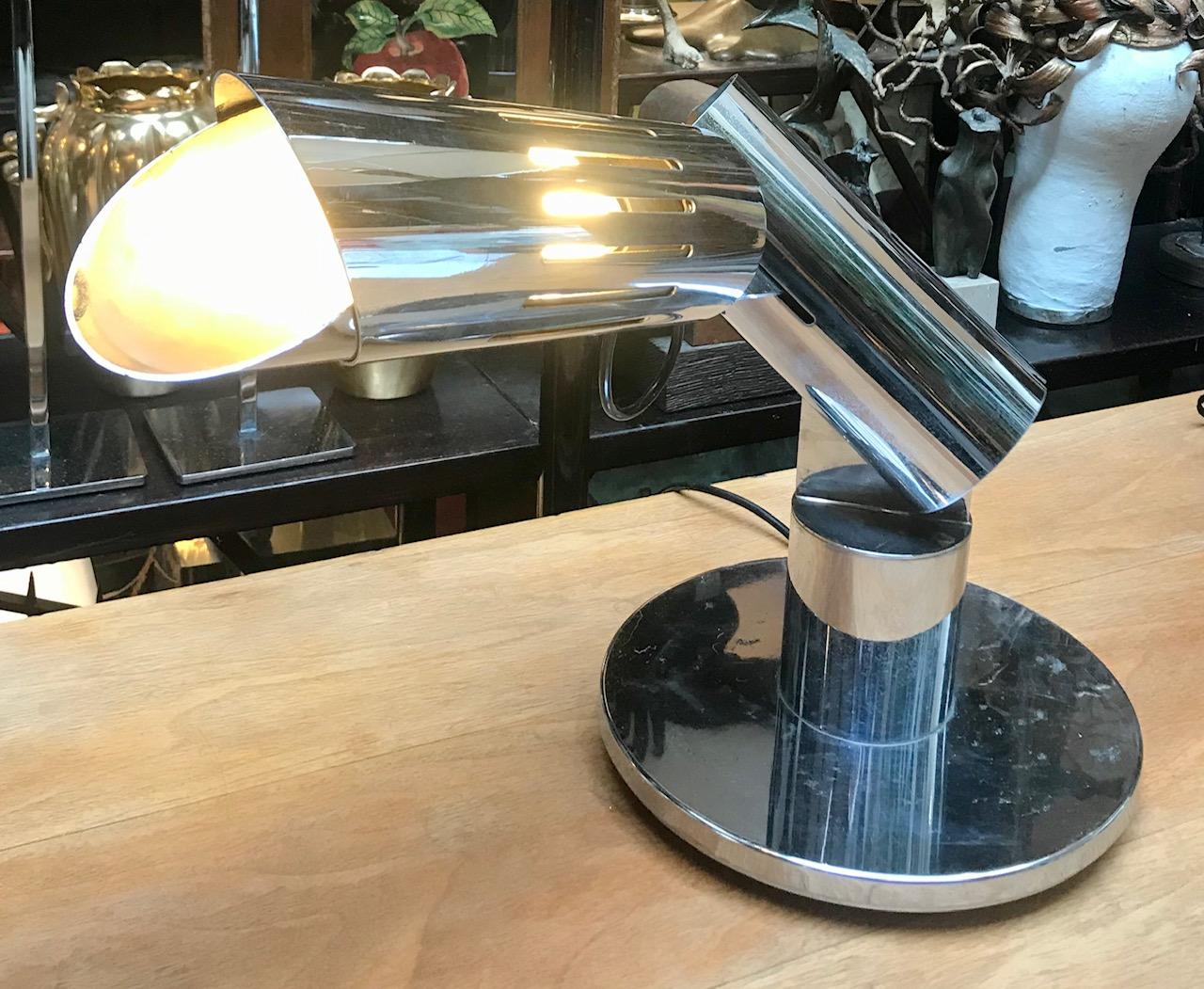 Stunning table lamp designed by Gabriel d'Ali and manufactured by Francesconi.

Chrome plated brass.

This light articulates into a variety of angles. Perforated cylinder can be twisted to display a range of photometric patterns.