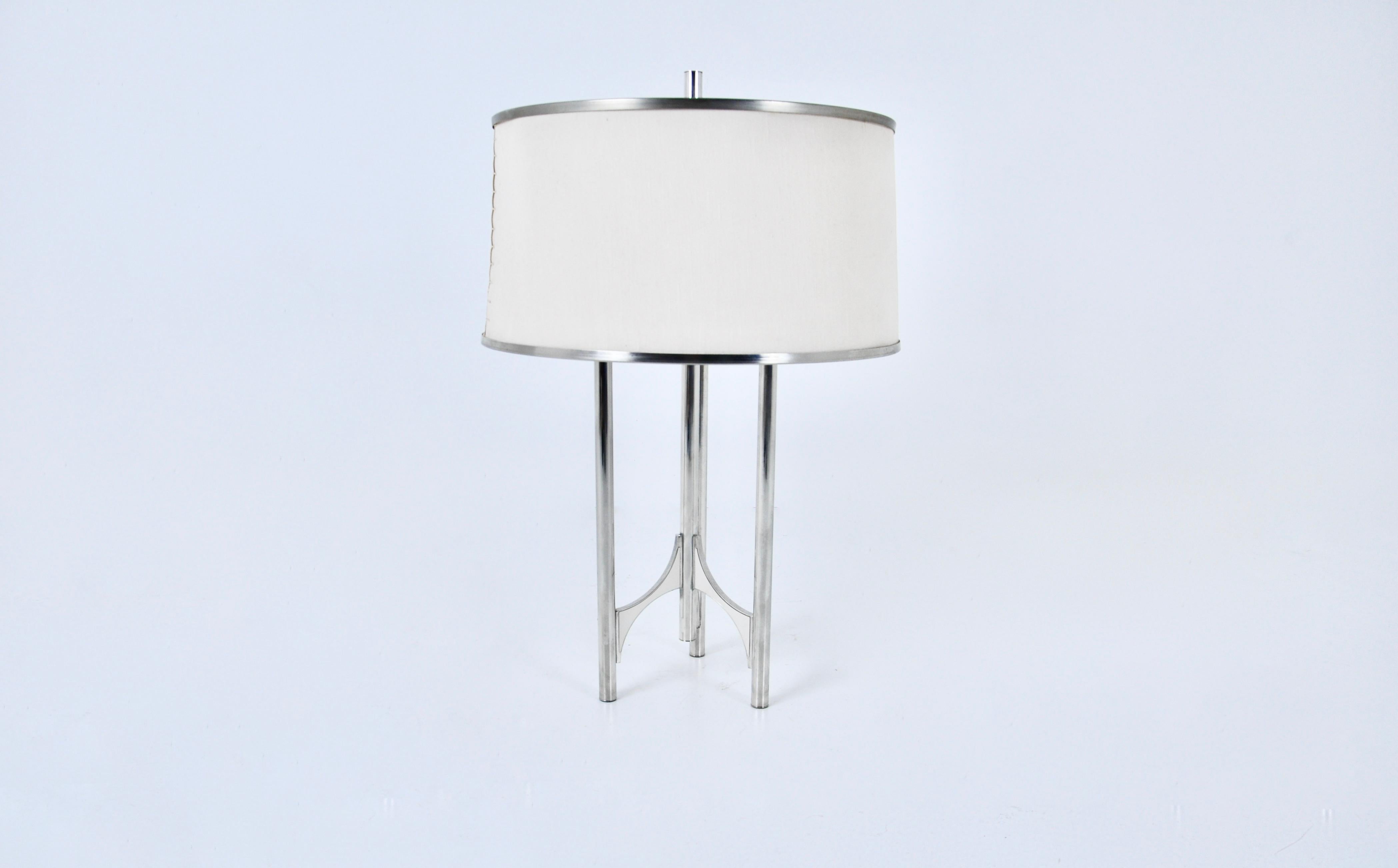 Metal lamp with metal shade and hand-sewn fabric. Stamped Sciolari on the top of the lamp and on the socket. Wear due to time and age of the lamp.