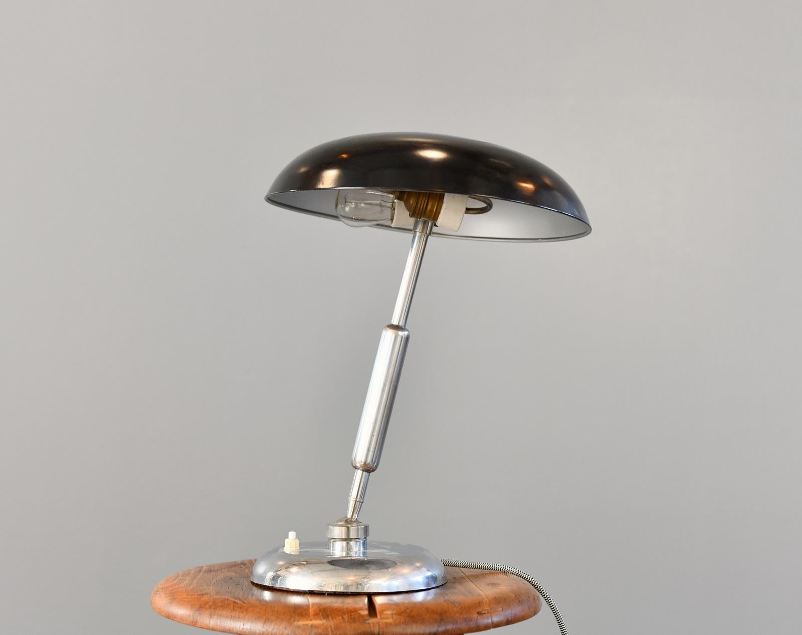Table Lamp By Giovanni Michelucci For Lariolux Circa 1940s

- Chrome base and arm
- Black painted aluminium shade
- Takes 2x E27 fitting bulbs
- On/Off switch on the base
- Designed by Giovanni Michelucci 
- Produced by Lariolux
- Italian ~ 1940s
-