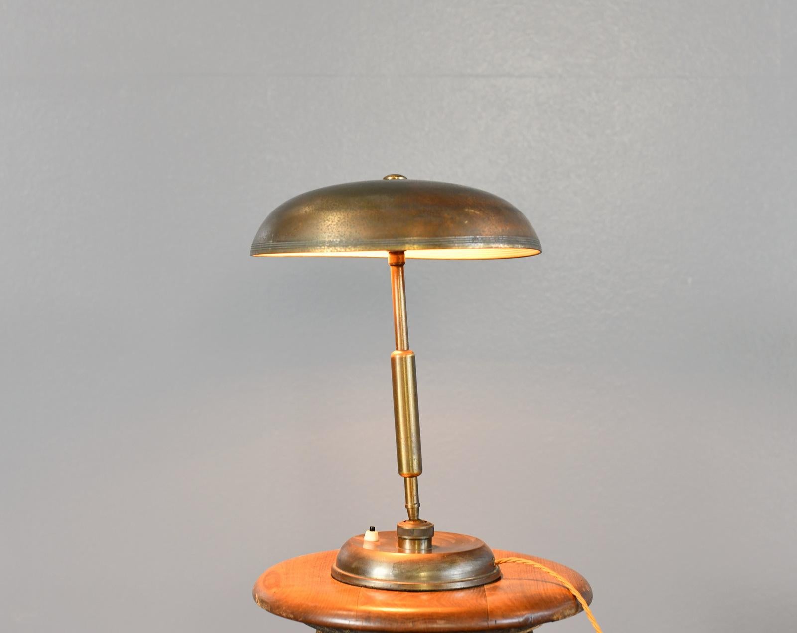 Table Lamp By Giovanni Michelucci For Lariolux Circa 1940s

- Brass base and arm
- Brass shade
- Takes 2x E27 fitting bulbs
- On/Off switch on the base
- Designed by Giovanni Michelucci
- Produced by Lariolux
- Italian ~ 1940s
- 32cm wide x 45cm