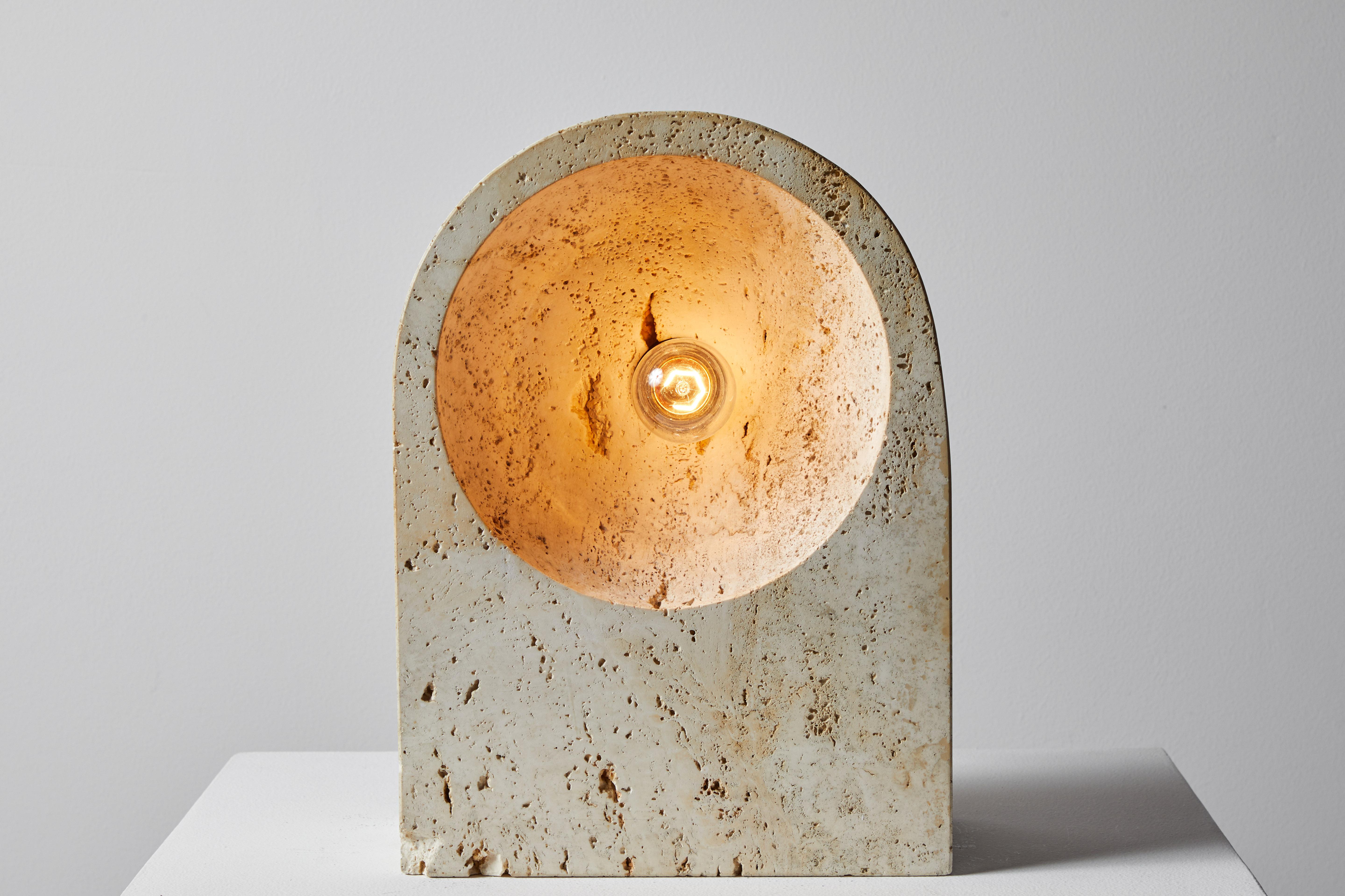 'Maja' table lamp by Giuliano Cesari for Nucleo Sormani. Designed and manufactured in Italy, 1969. Travertine, original cord. Retains original manufacturer's label. Takes one E27 75 w maximum Edison bulb. Bulbs provided as a one time