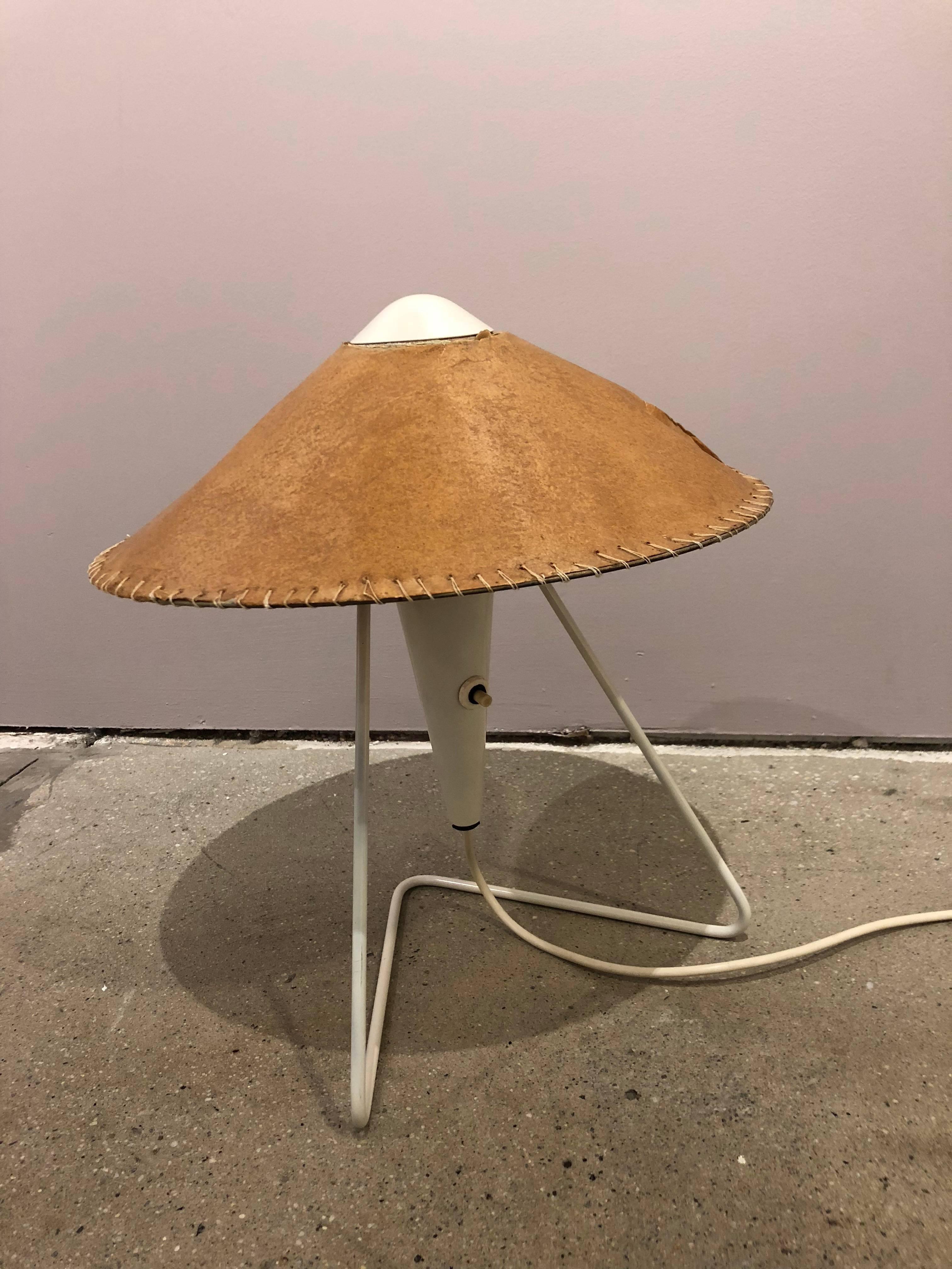 Table lamp with metal frame and parchment shade. Designed by Helena Frantová. The lamp is in good original condition. Shade has definite wear.