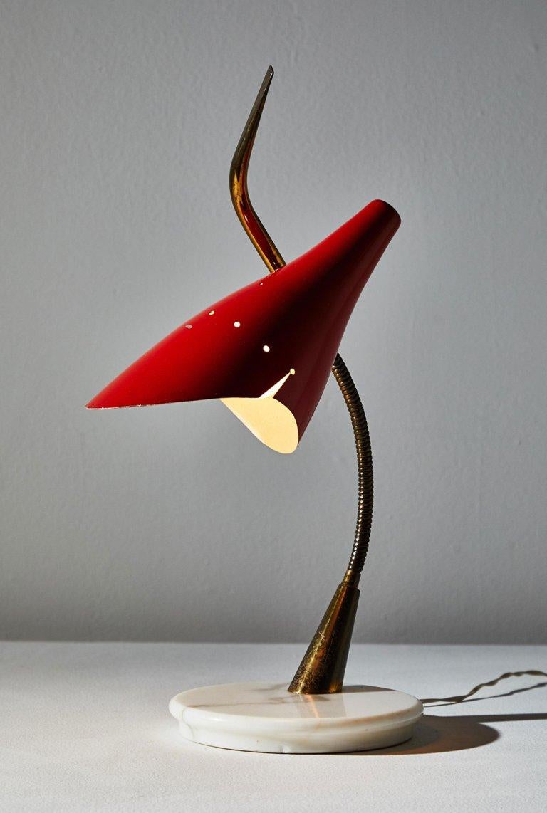 Table lamp manufactured by Lumen in Italy circa 1950s. Original enameled metal, gooseneck brass stem with marble base. Shade and stem adjust to a variety of position. On/off hand switch, original cord. Takes one E27 60w maximum bulb.