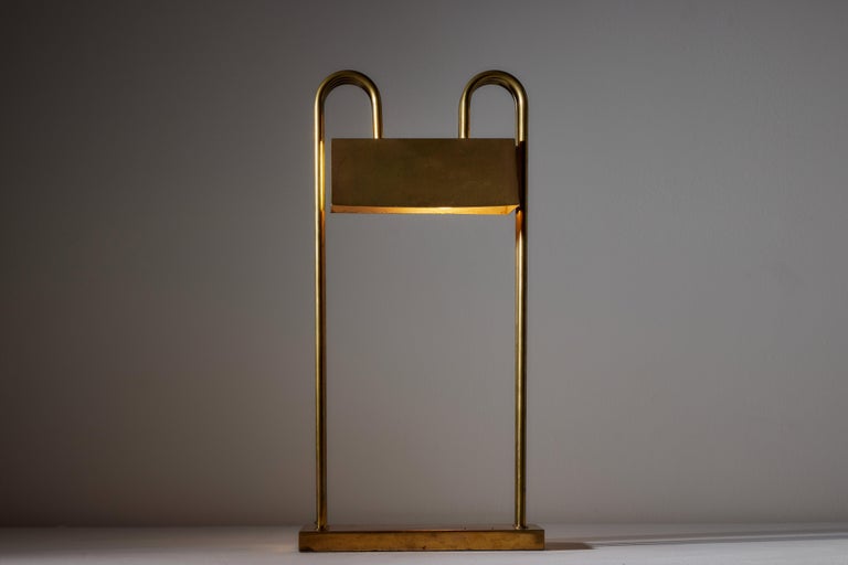 Table Lamp by Marcel Breuer. Designed and manufactured in Paris, circa 1920's. Brass. Original EU cord. We recommend one E27 60w maximum bulb. Bulb not included. Retains original stamp Exposition Paris, 1925 Marcel Breuer.