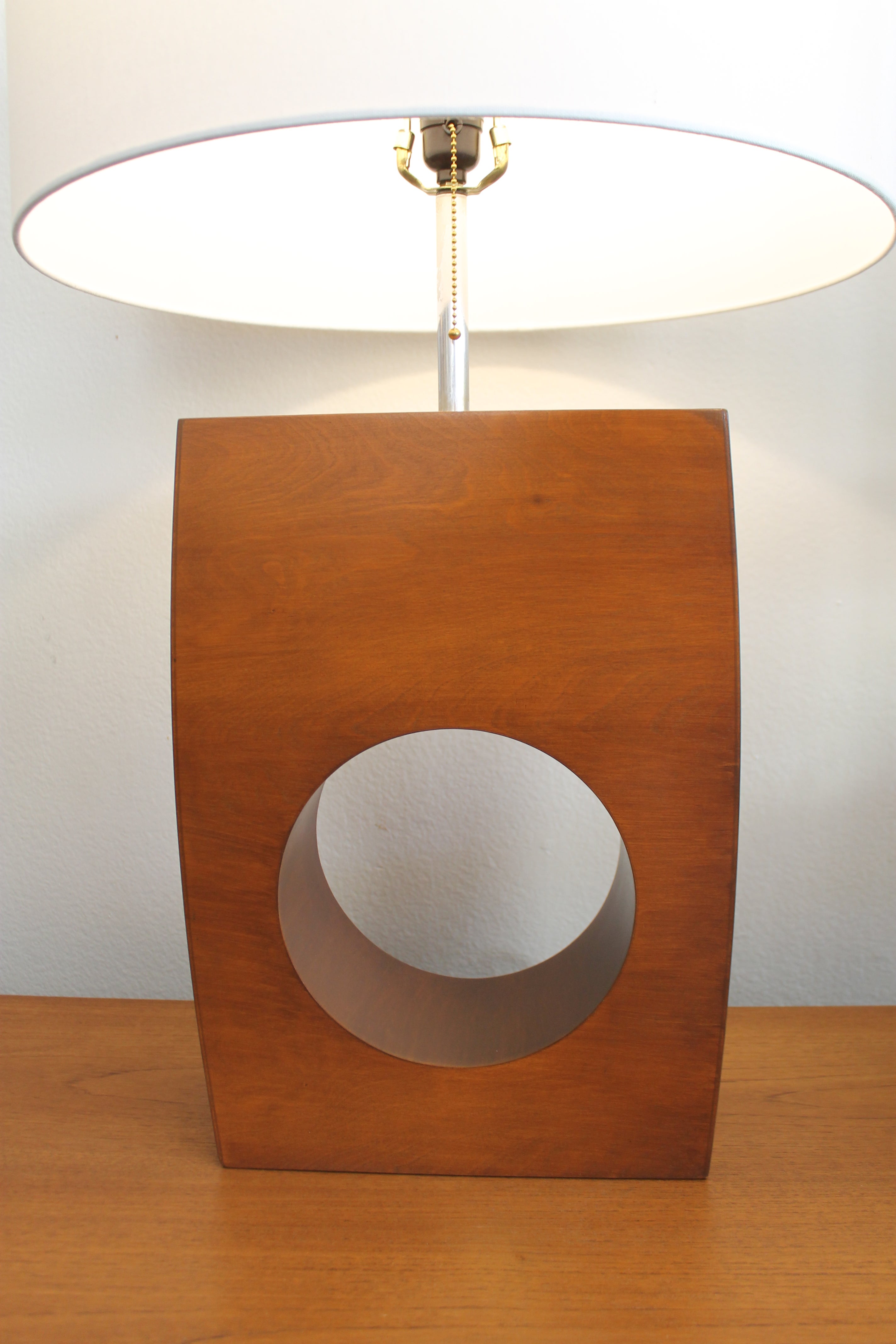 Table lamp by the Modeline Lamp Company. We call it a donut hole lamp. Lamp measures 13