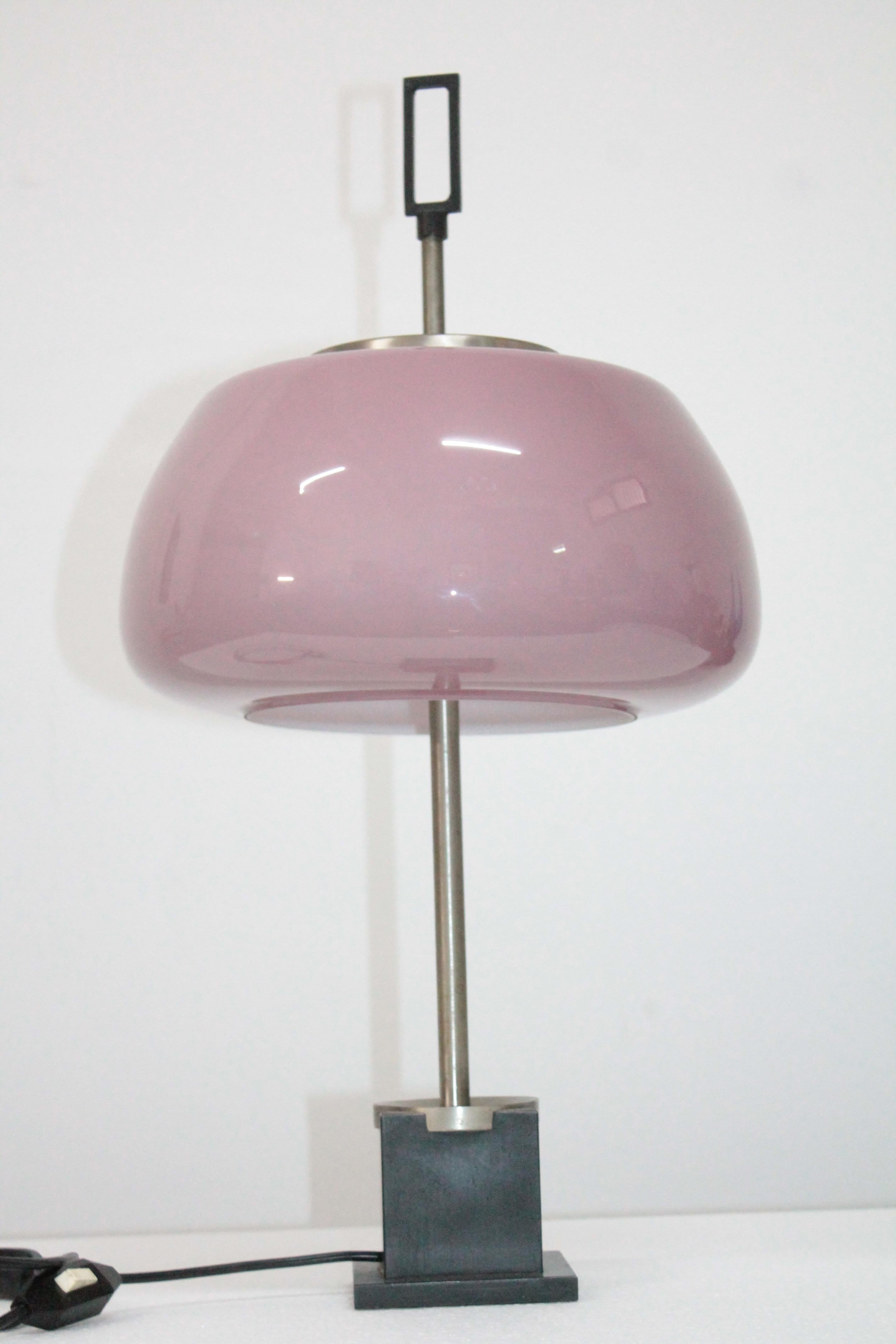 A table lamp designed by Oscar Torlasco and produced by Lumi. Black cast iron base with chrome insert and up-stand with opaline glass shade. 
Italian 1950s.
H:53cm Glass Shade 28cm x 16cm.