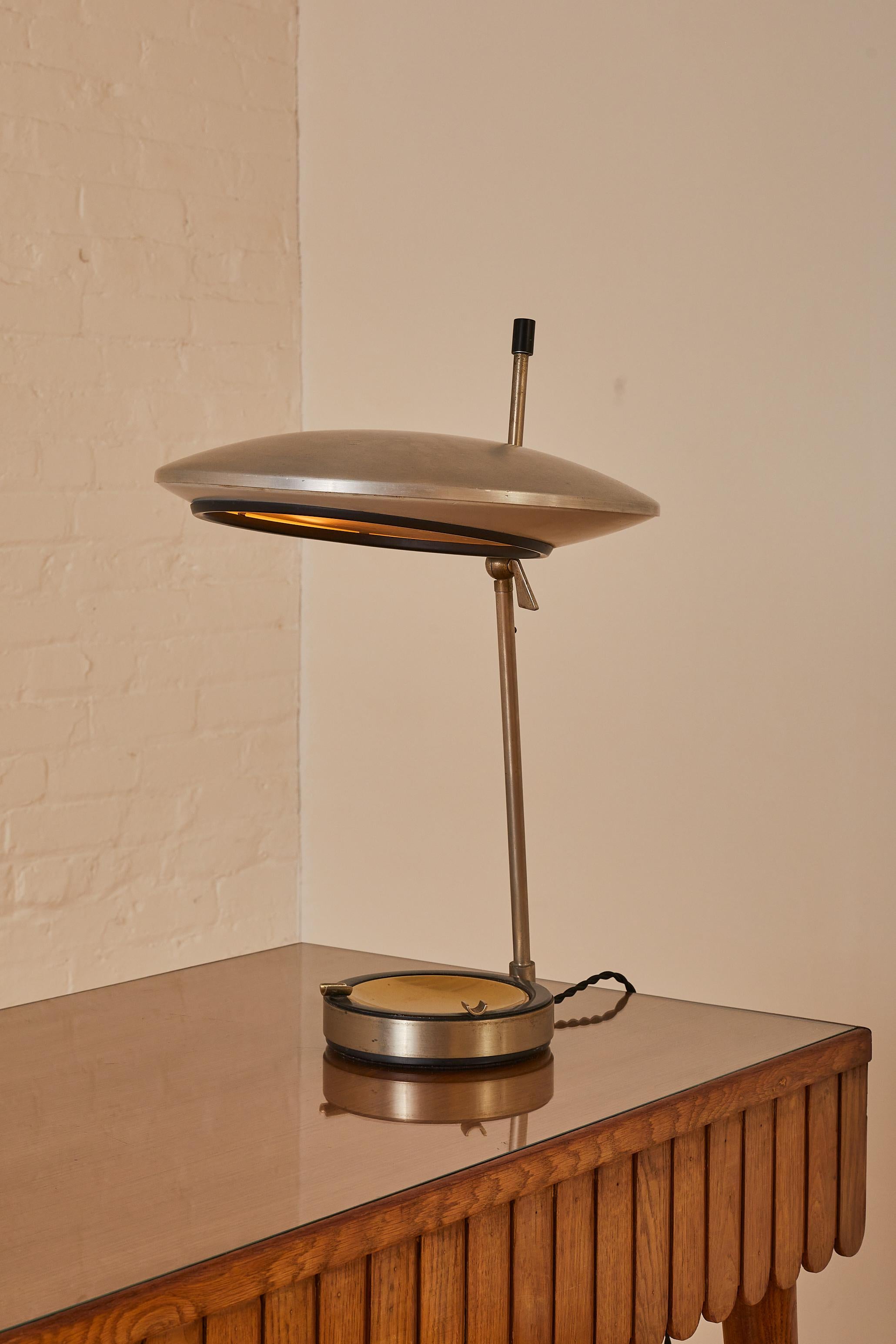 Table Lamp by Oscar Torlasco (Model 567) for Lumi Milano. The lampshade can be adjusted in several directions.

