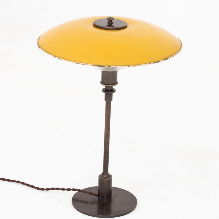 PH 3,5/2 - Table lamp in browned brass with yellow cobber top and matt glass shades. Stamped 