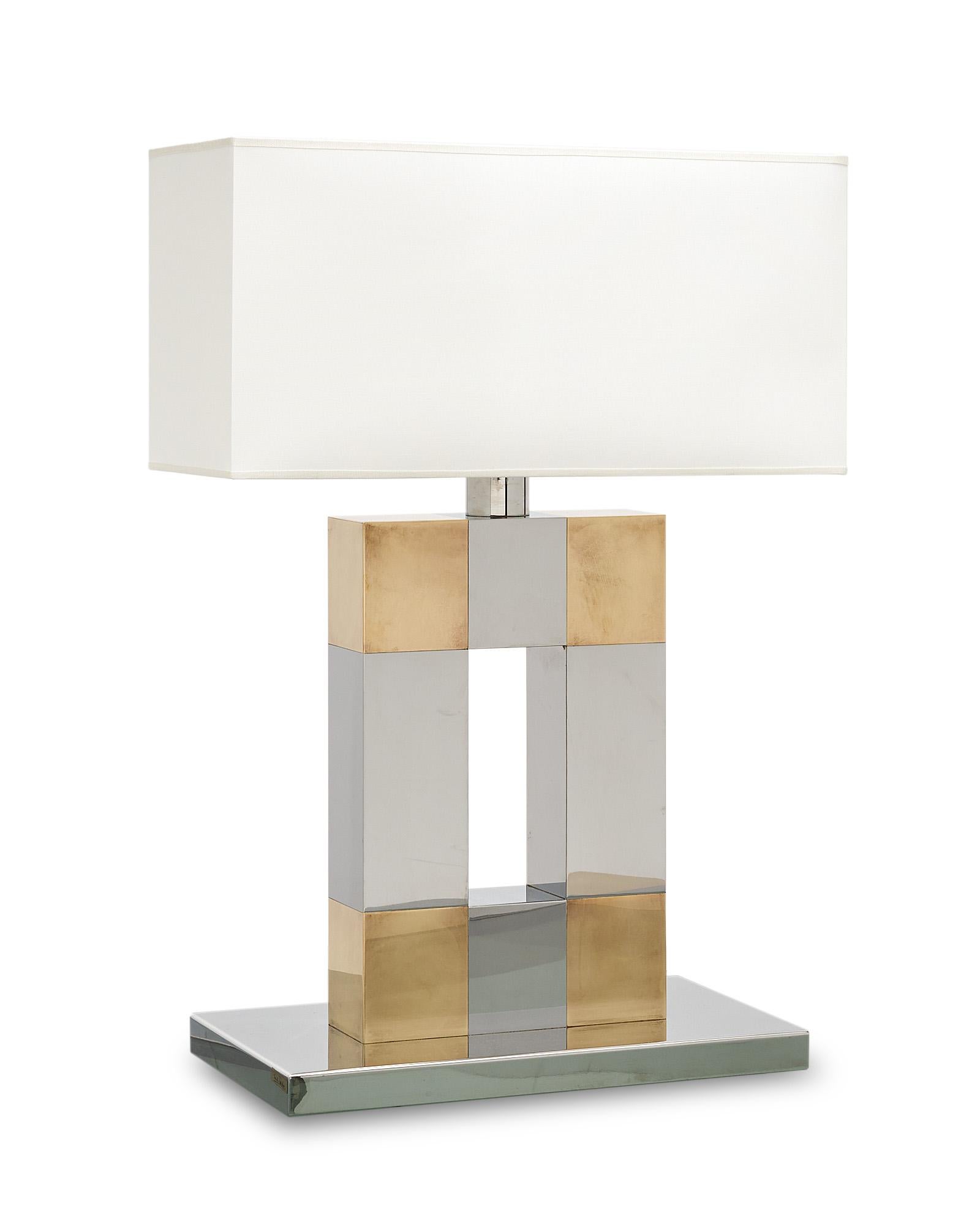 Table lamp, Italian, made of chrome and brass. This piece is by iconic designer Sandro Petti (signed) and originally came from the apartment of Zefferelli’s costume designer in Rome. This piece has been newly wired to US standards.