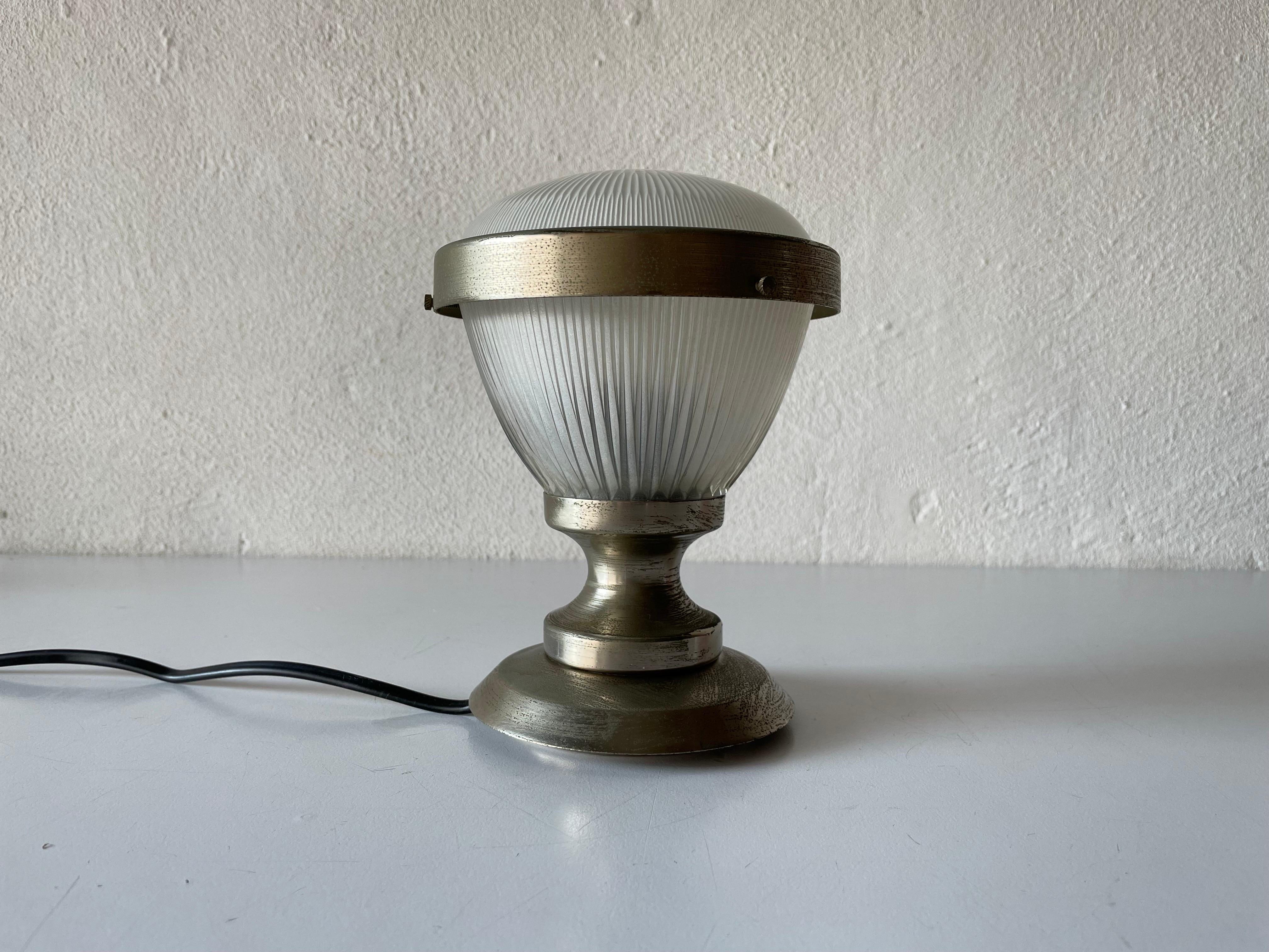 Table lamp by Sergio Mazza, 1960s, Italy

Lampshade is in very good vintage condition.

It has European plug. It can be converted to other countries plugs with using converter. Also it can be rewired different type of plugs that you use