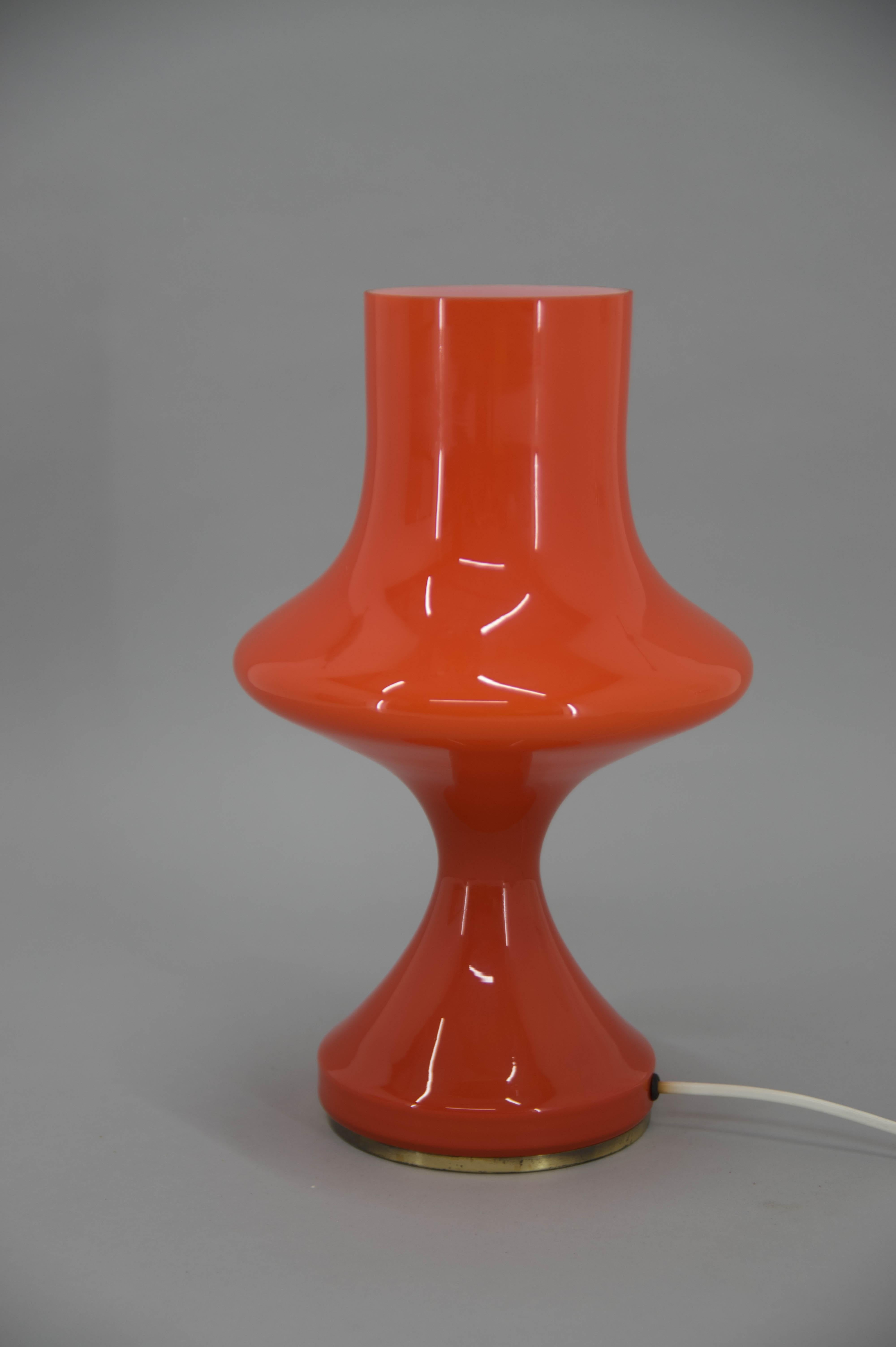 Red glass table lamp designed by Stepan Tabera for Czechoslovakian company OPP Jihlava in early 1970s. Two layers of glass - white inside and red outside. Bottom base made of brass.
1x60W, E25-E27 bulb
US plug adapter included.