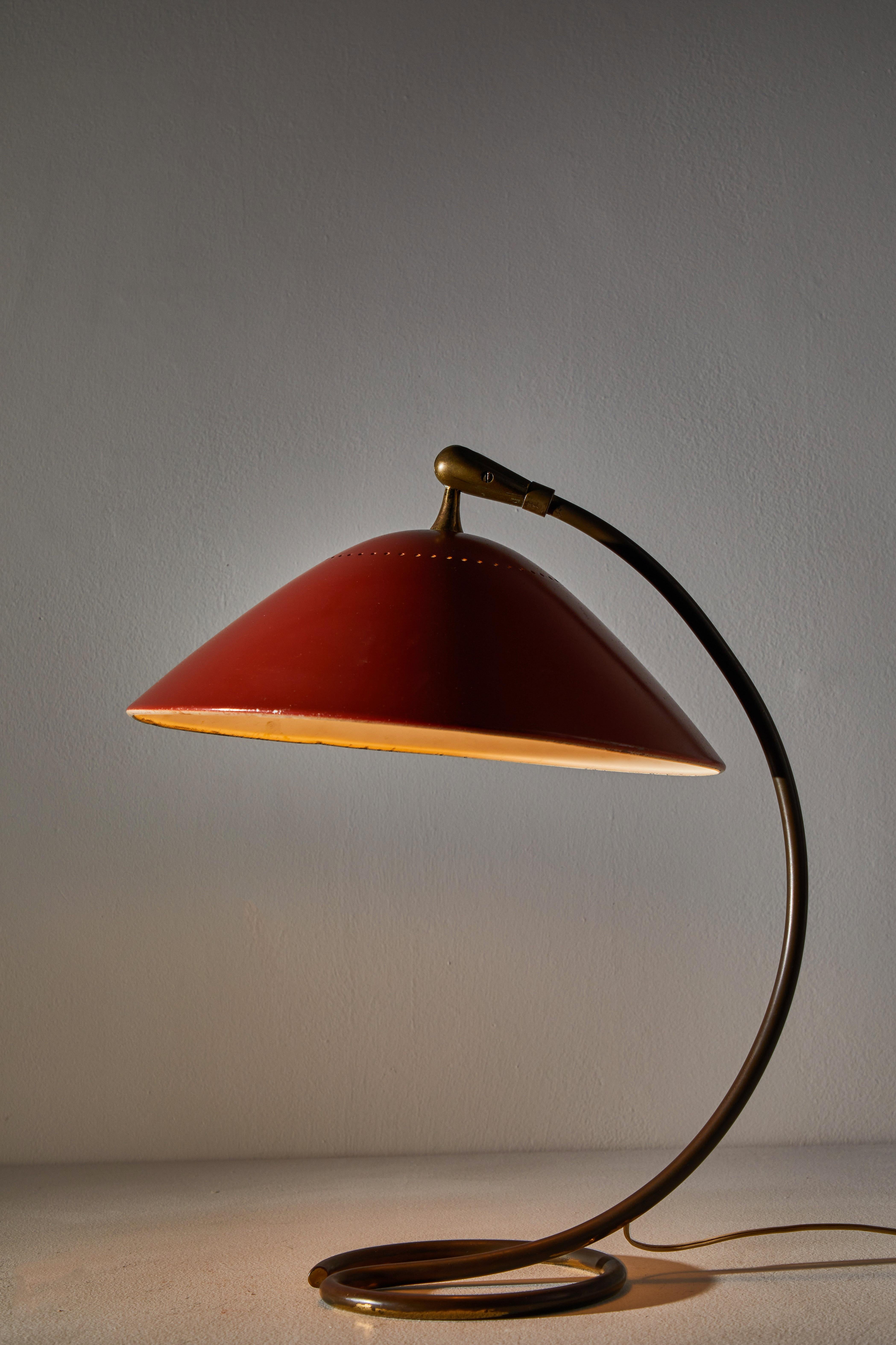 Table Lamp by Stilnovo. Manufactured in Italy, circa 1950s. Original enameled metal, brass. Original cord. We recommend one E14 100w maximum candelabra bulb. Bulb provided as a one time courtesy.