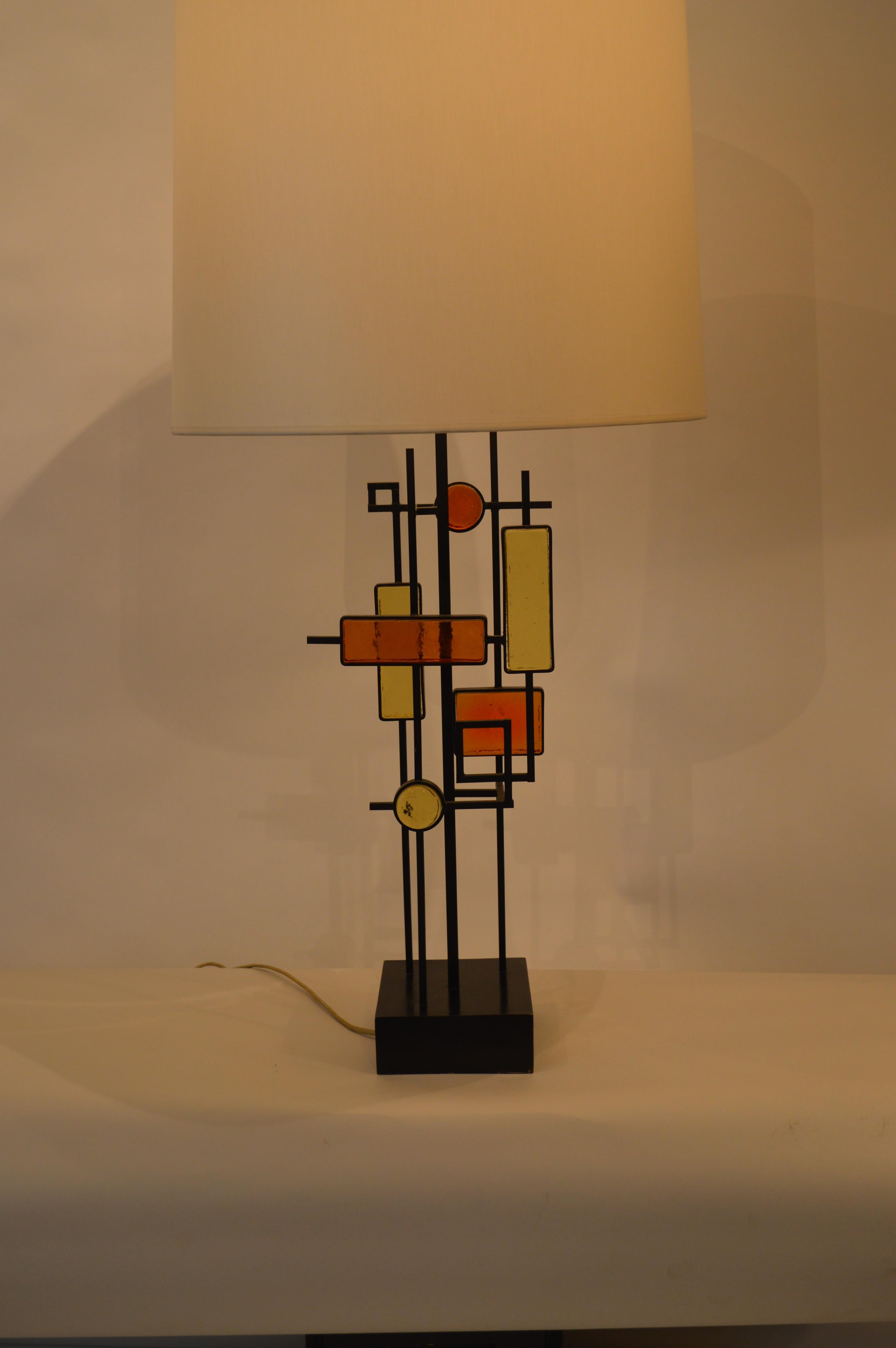 Table lamp by Holm Sorensen.
Glass and lacquered metal.
Danish work, circa 1960.
Lampshade redone as original with removable top.
       