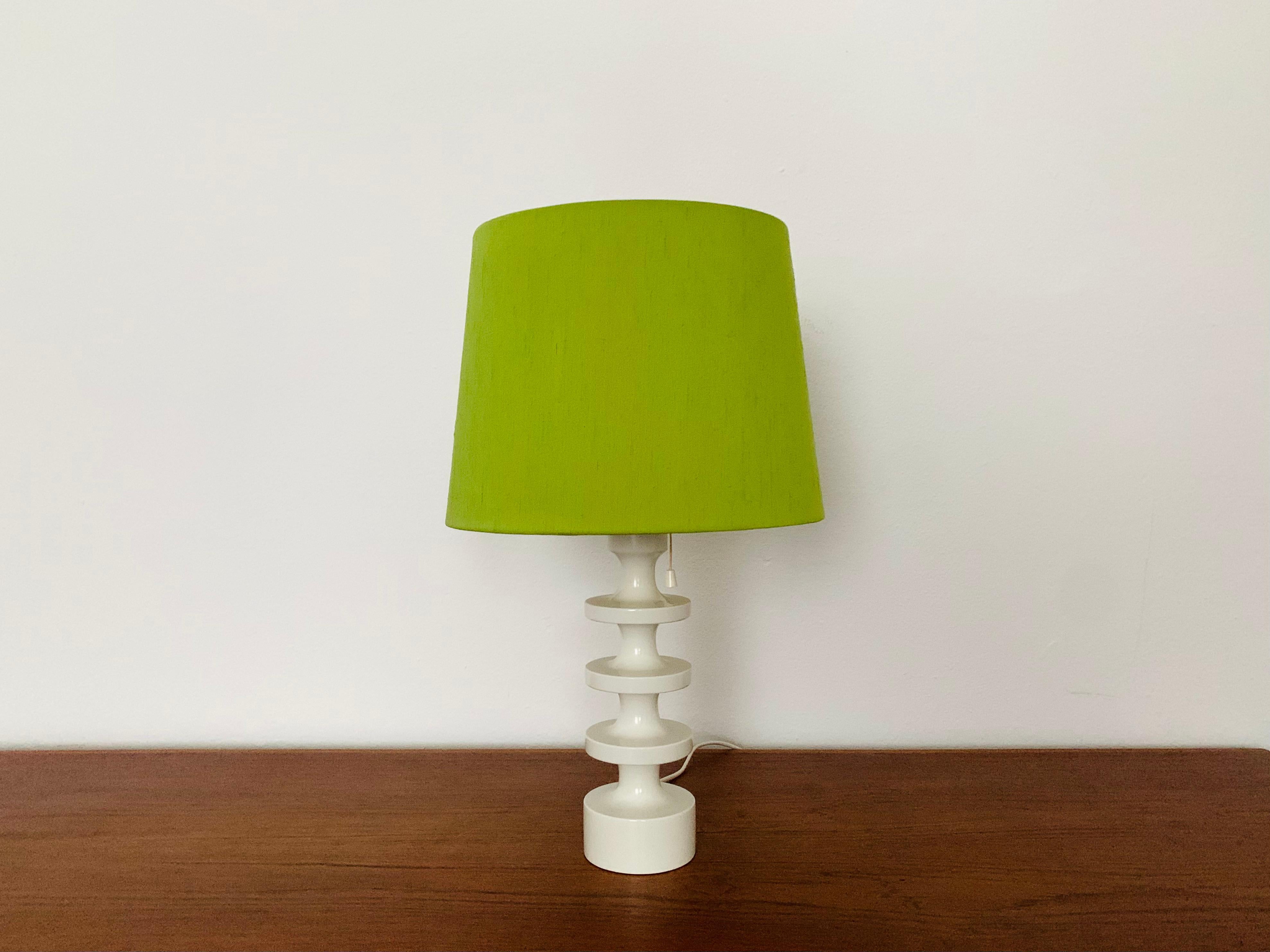 Extremely rare and beautiful Swedish table lamp from the 1960s.
Great and unusual design with a fantastically elegant appearance.

Manufacturer: Luxury
Design: Uno and Östen Kristiansson

Condition:

Very good vintage condition with slight