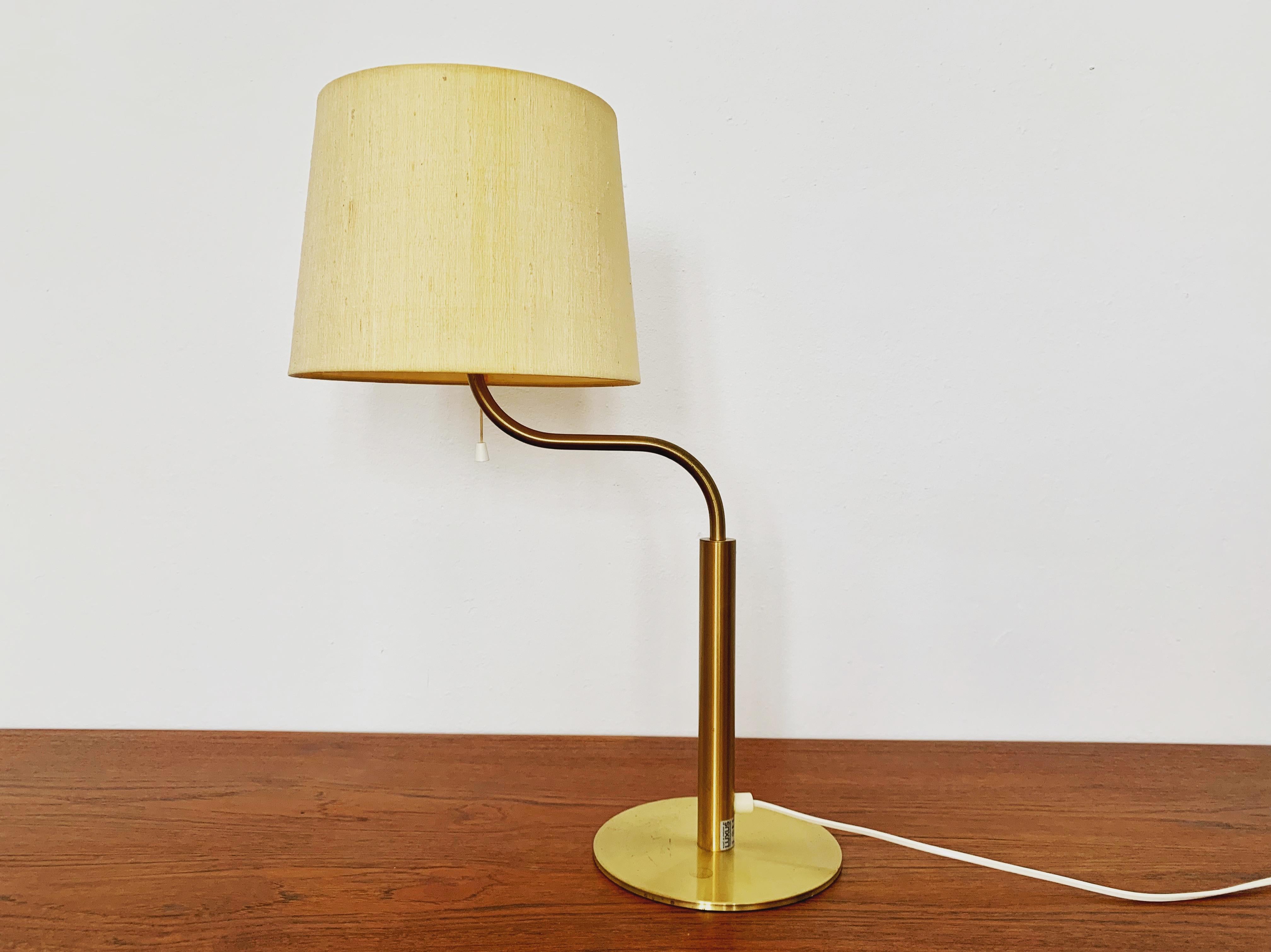 Extremely rare and beautiful Swedish table lamp from the 1960s.
Great and unusual design with a fantastically elegant appearance.

Manufacturer: Luxus
Design: Uno and Östen Kristiansson

Condition:

Very good vintage condition with slight