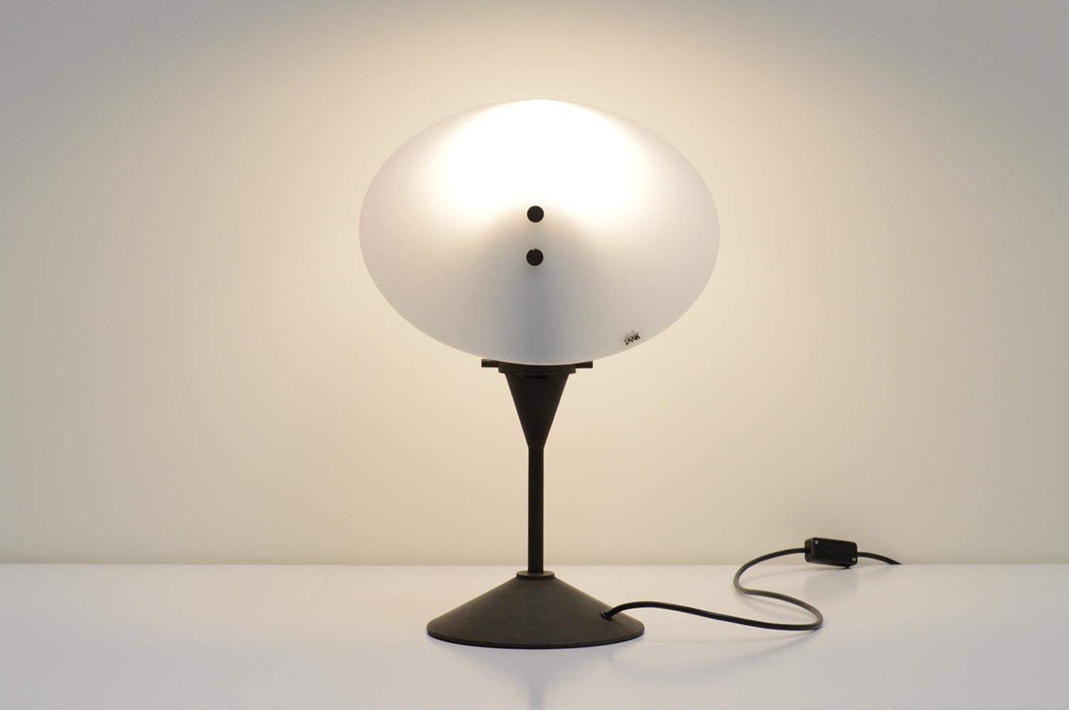 Table lamp by VeArt, Italy 1980s. White glass cone shaped shade and metal patinated base. This is a rare lamp as we can not find another one. Marked with VeArt logo on the shade. Positon as you like to get your optimal effect. Some wear on the base.