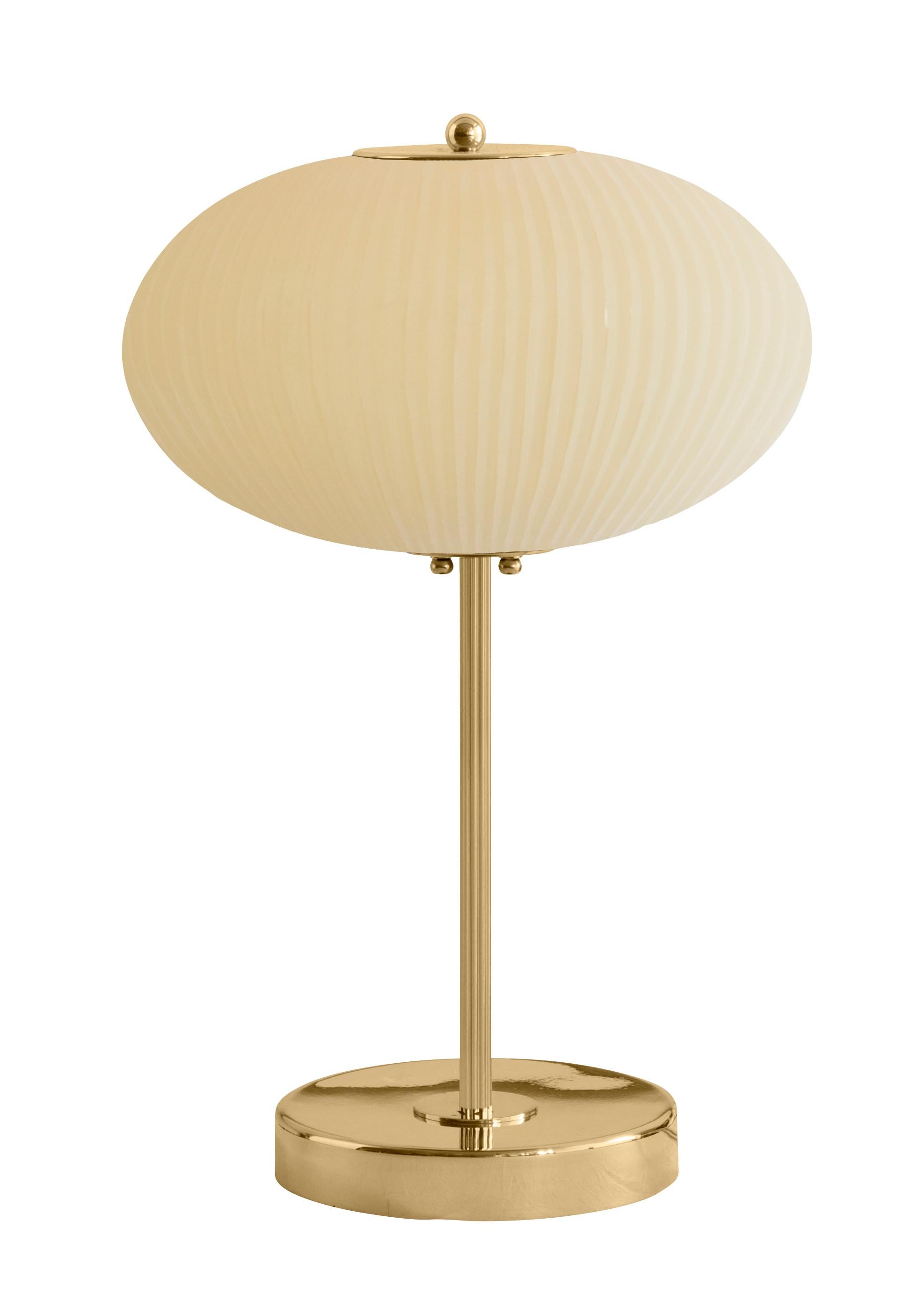 Table lamp China 07 by Magic Circus Editions
Dimensions: H 50 x W 32 x D 32 cm
Materials: Brass, mouth blown glass sculpted with a diamond saw
Colour: mustard

Available finishes: Brass, nickel
Available colours: enamel soft white, soft rose,