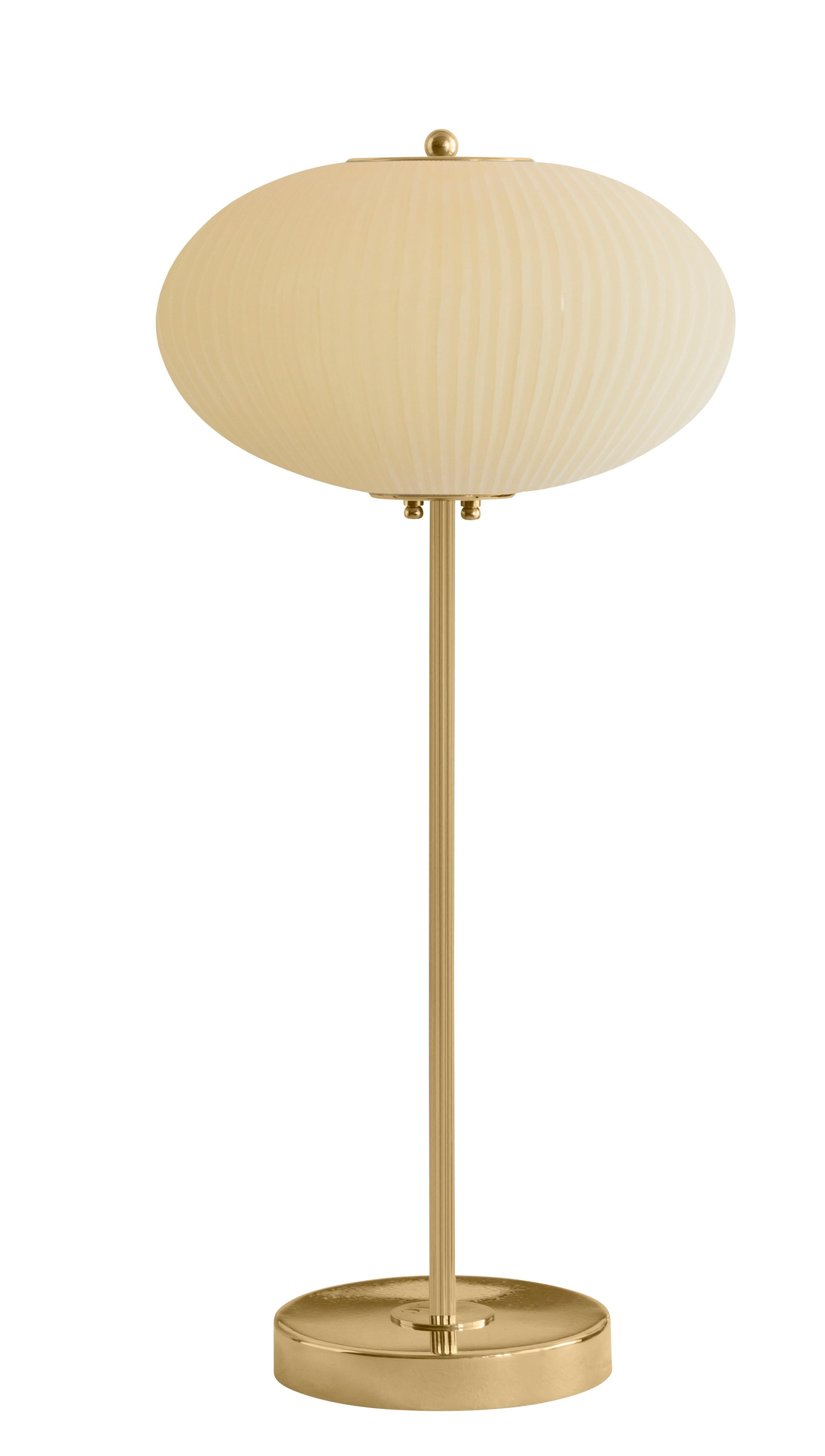 Table lamp China 07 by Magic Circus Editions
Dimensions: H 70 x W 32 x D 32 cm
Materials: Brass, mouth blown glass sculpted with a diamond saw
Colour: mustard yellow

Available finishes: Brass, nickel
Available colours: enamel soft white, soft