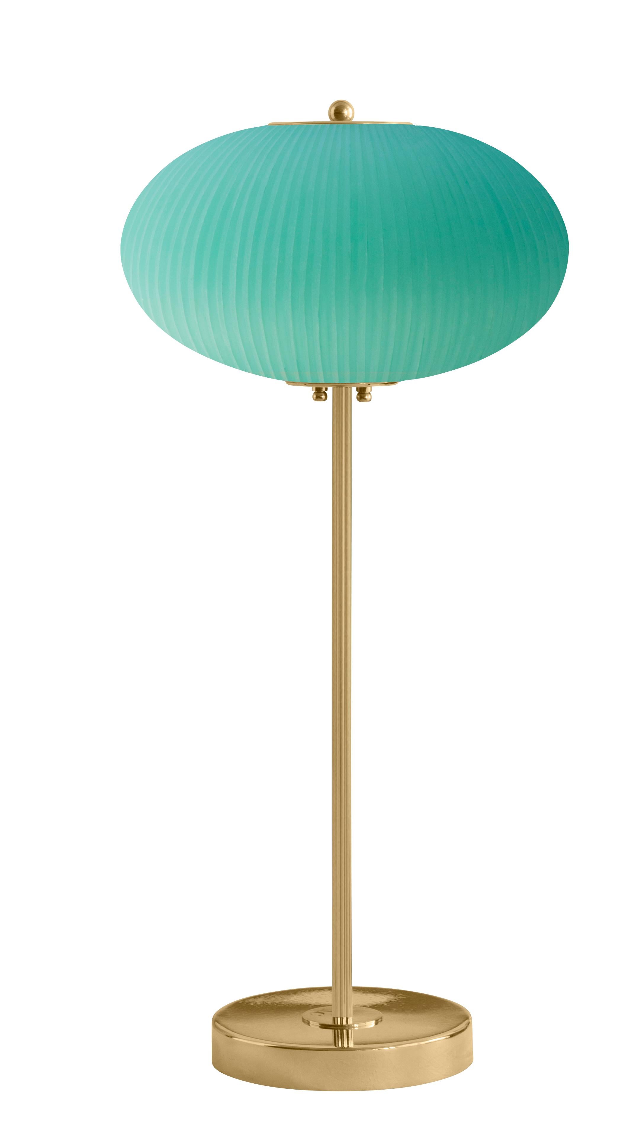 Table lamp China 07 by Magic Circus Editions.
Dimensions: H 70 x W 32 x D 32 cm.
Materials: brass, mouth blown glass sculpted with a diamond saw.
Colour: jade green.

Available finishes: brass, nickel.
Available colours: enamel soft white,