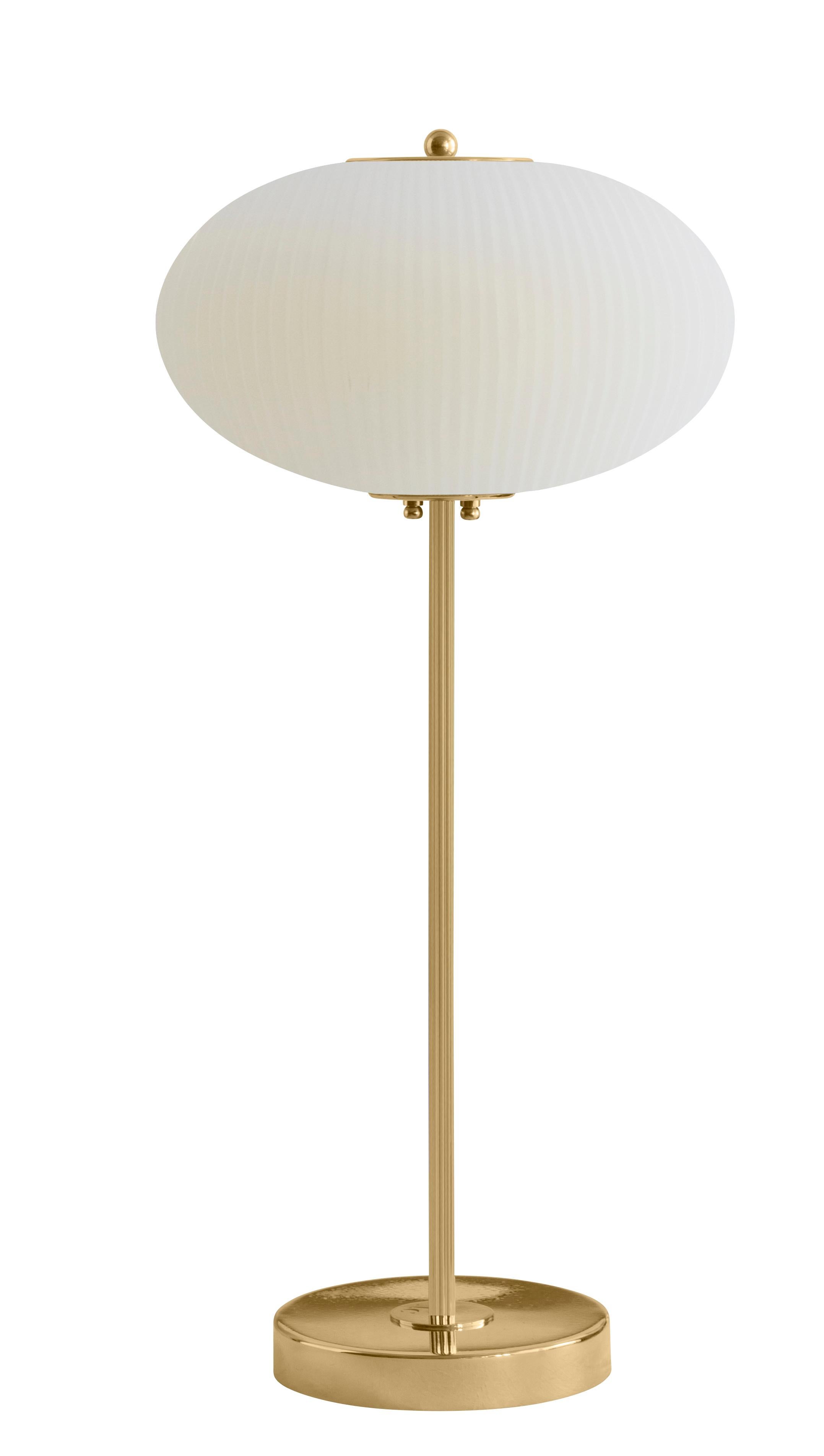 Table lamp China 07 by Magic Circus Editions
Dimensions: H 70 x W 32 x D 32 cm
Materials: Brass, mouth blown glass sculpted with a diamond saw
Colour: ivory

Available finishes: Brass, nickel
Available colours: enamel soft white, soft rose,