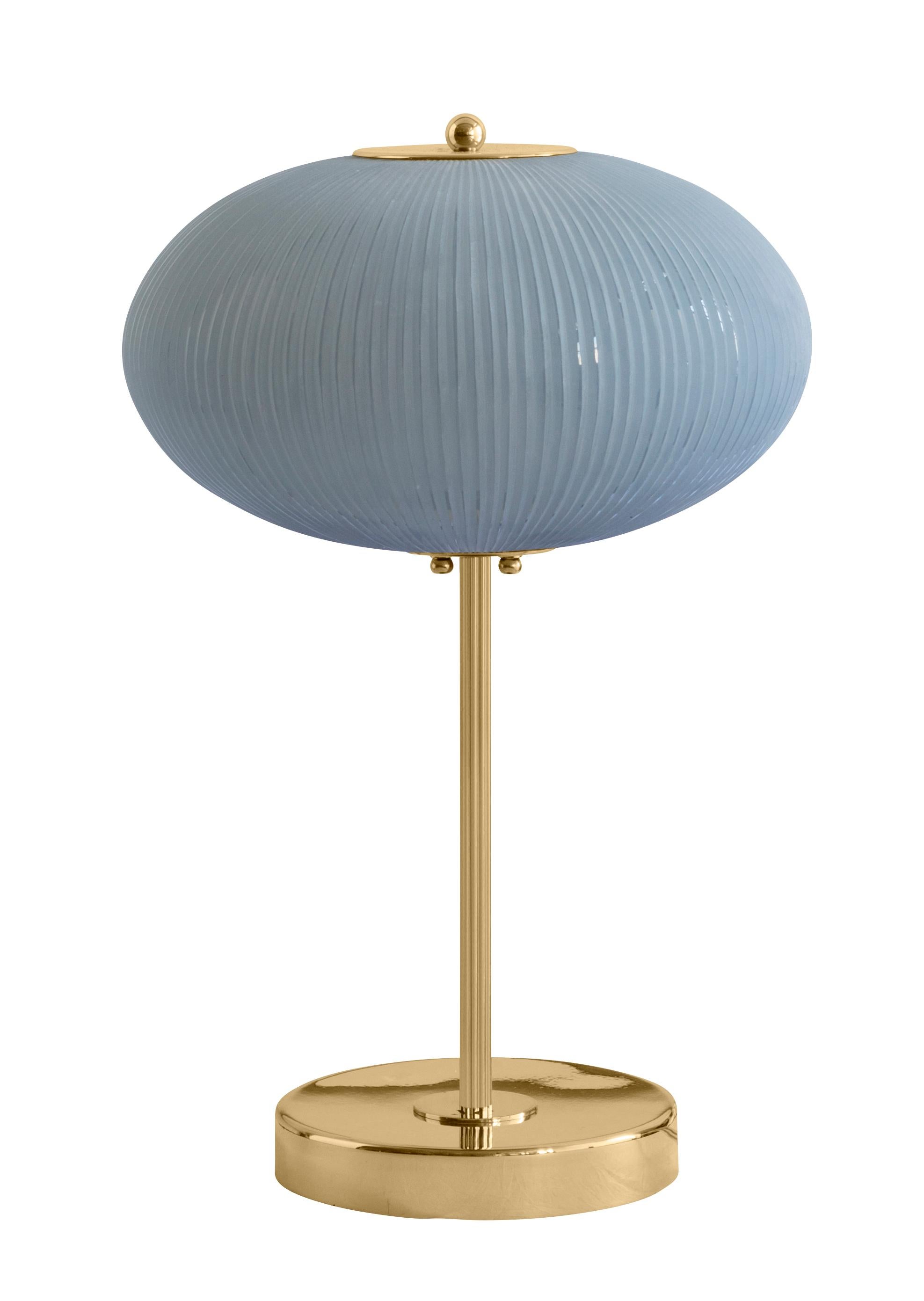 Table lamp China 07 by Magic Circus Editions
Dimensions: H 50 x W 32 x D 32 cm
Materials: Brass, mouth blown glass sculpted with a diamond saw
Colour: opal grey

Available finishes: Brass, nickel
Available colours: enamel soft white, soft