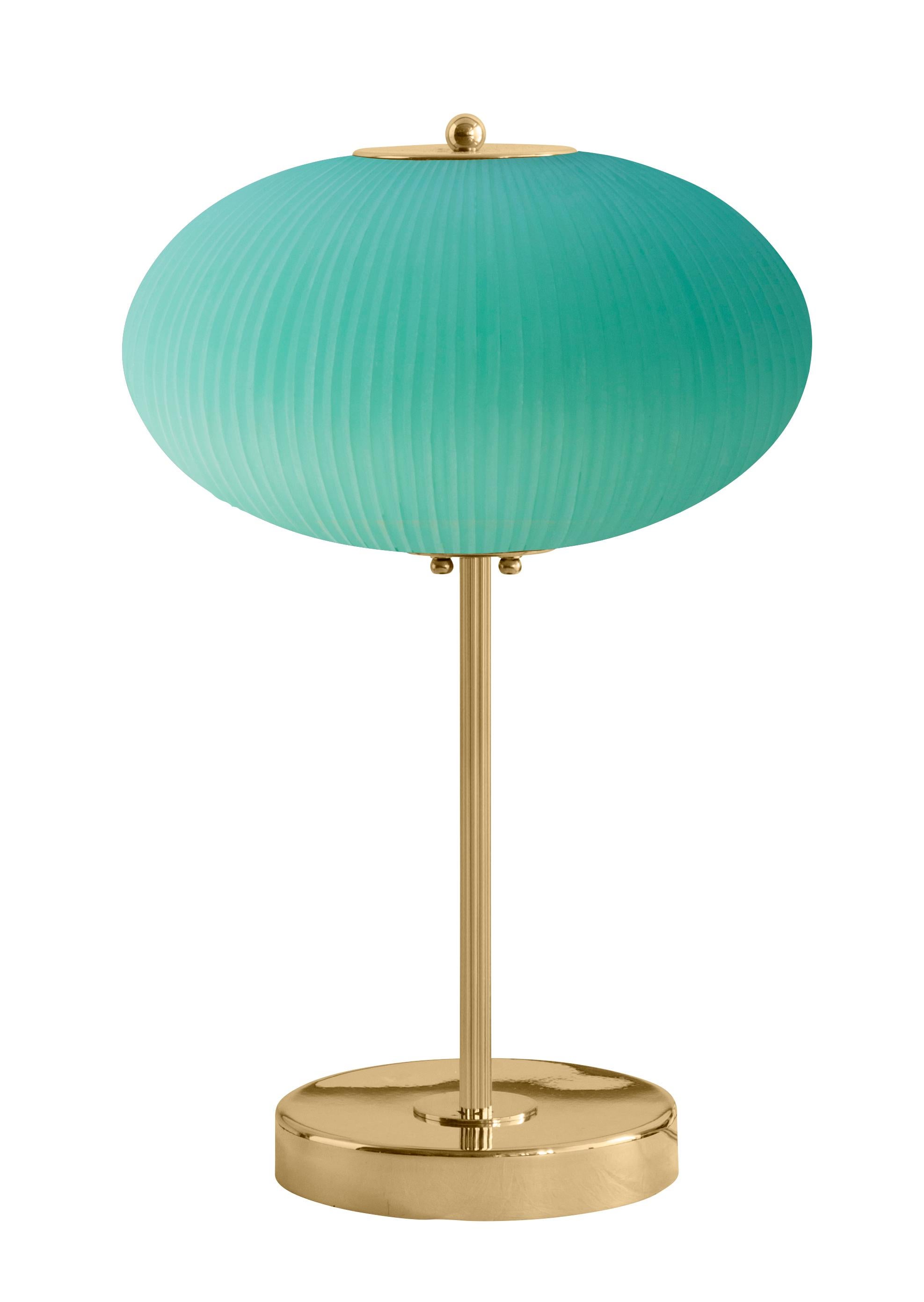 Table lamp China 07 by Magic Circus Editions
Dimensions: H 50 x W 32 x D 32 cm
Materials: Brass, mouth blown glass sculpted with a diamond saw
Colour: Jade green

Available finishes: Brass, nickel
Available colours: enamel soft white, soft