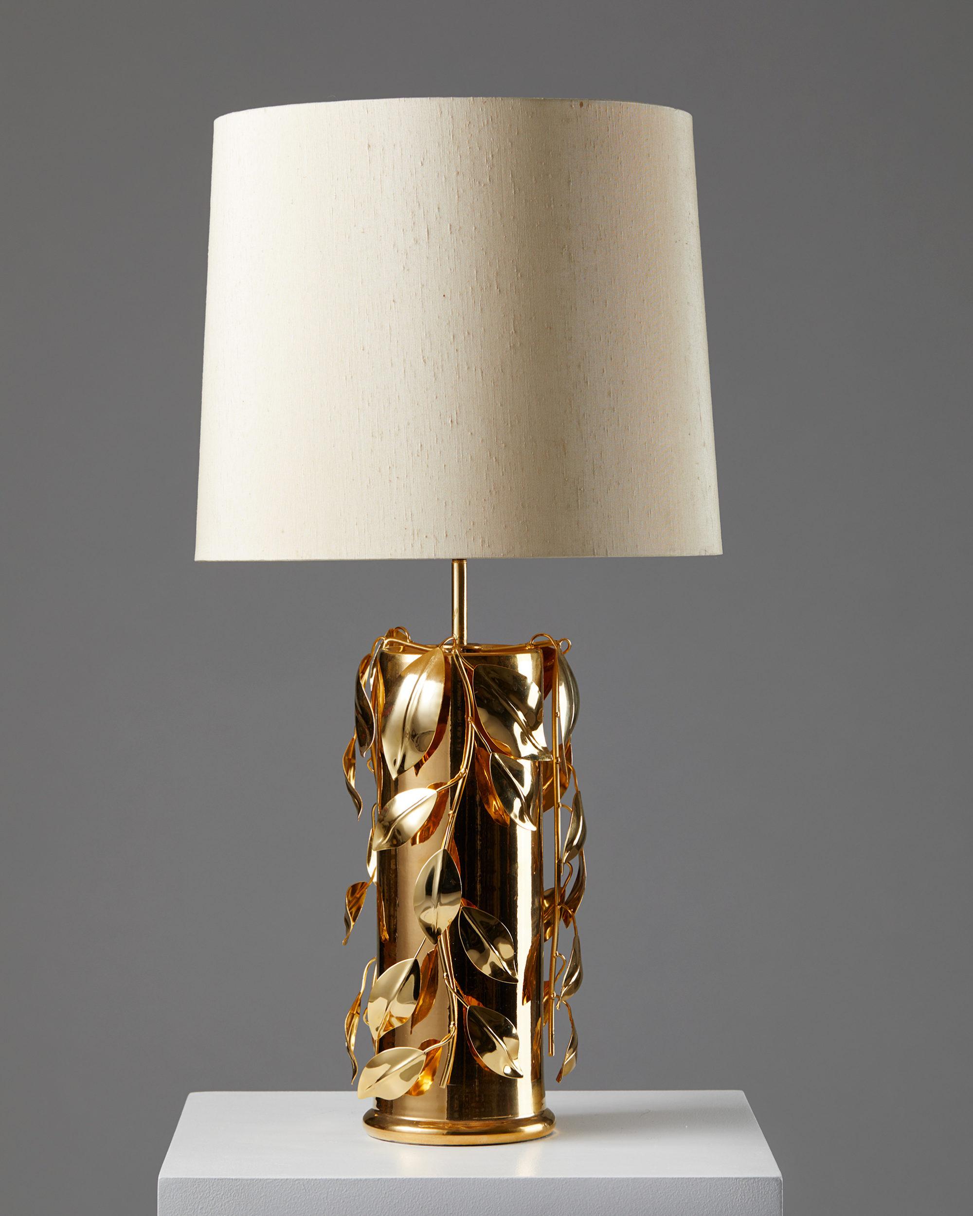 Table lamp designed by Bertil Brisborg for Nordsika Kompaniet,
Sweden. 1960s.

Ceramic and brass with fabric shade.

Stamped.

Measurements: 
H: 44 cm/ 17 10/32