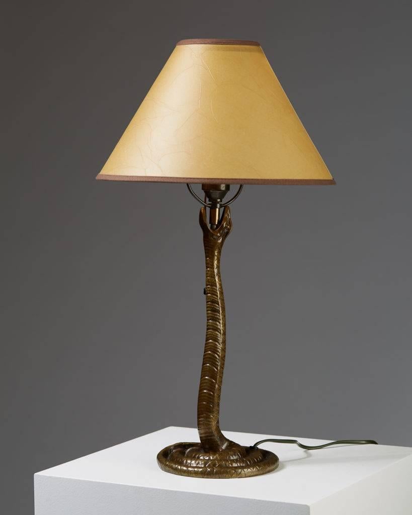 Table lamp designed by Edvard Trulsson, 
Sweden, 1940s.

Bronze and fabric shade.