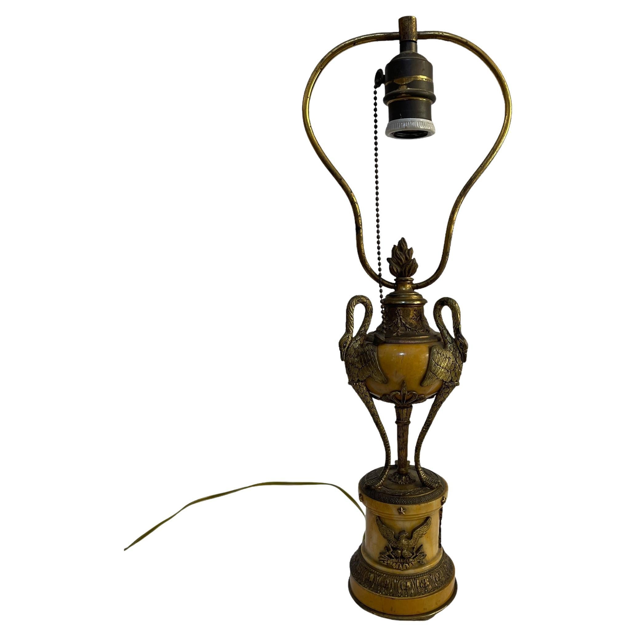 Table lamp, early 20th century, Empire style, bronze and onyx For Sale