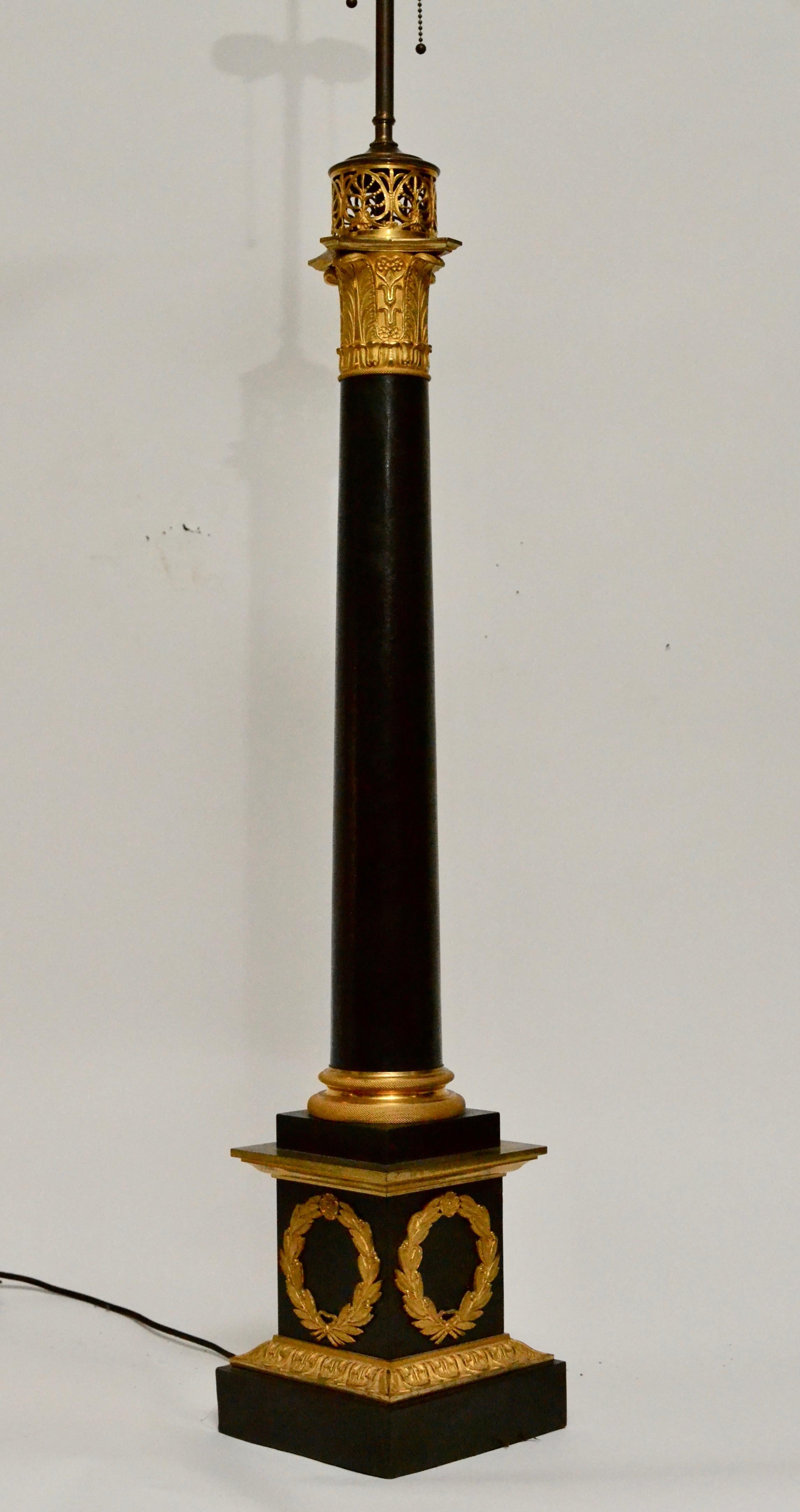 Large gilt and patinated Empire bronze table lamp from the first half of the 19th century. Now fitted with electricity.  Height with fitting 123cm (48.5inches),87cm (34.25 inches) without.
