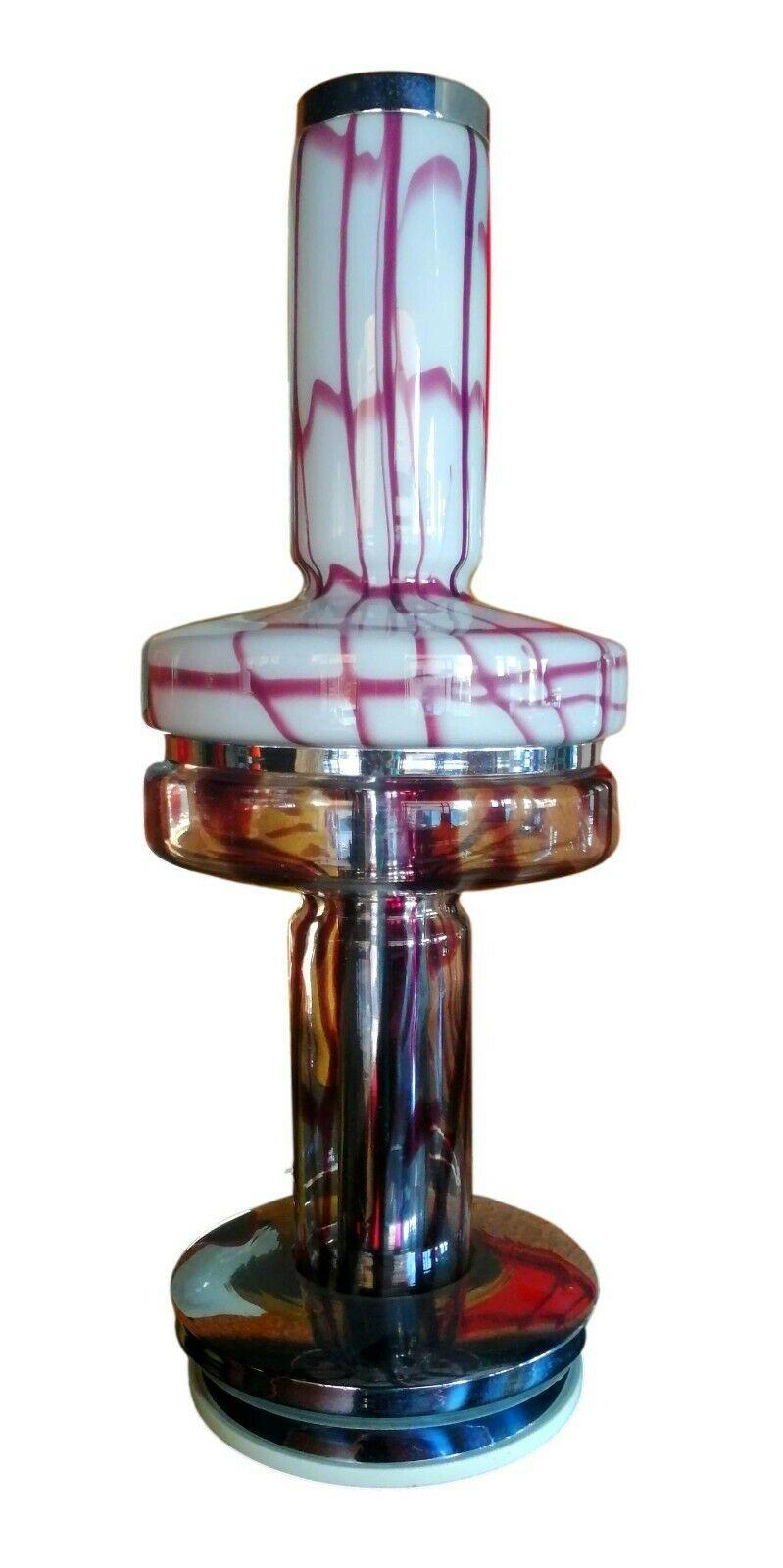 Table or floor lamp, Esperia production based on a design by Angelo Brotto Murano puffed and variegated white and purple

It measures 80 cm in height, in very good storage conditions, as shown in photos, with no cracks, chips or missing parts.